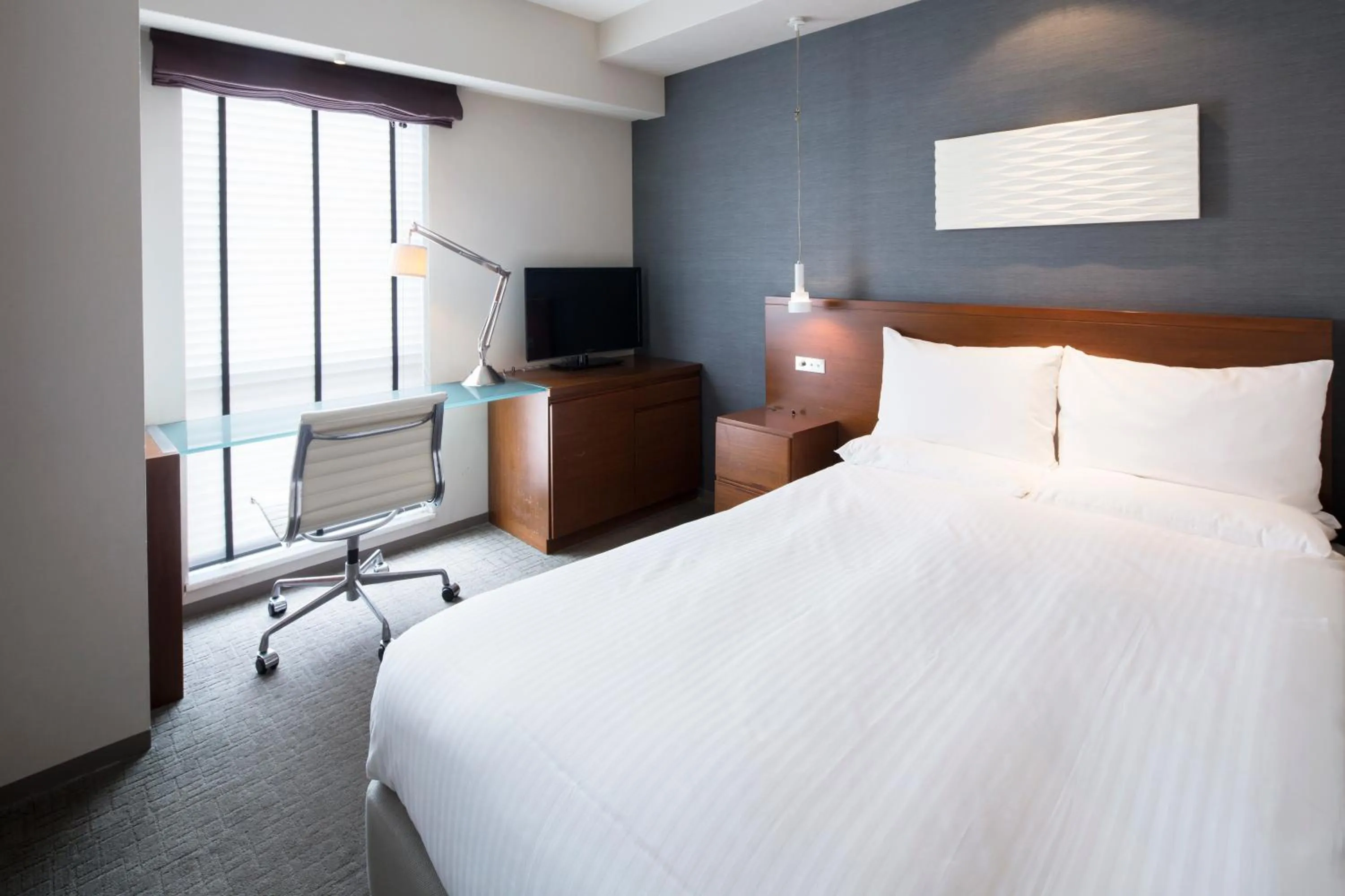 Photo of the whole room, Bed in HOTEL MYSTAYS Oita