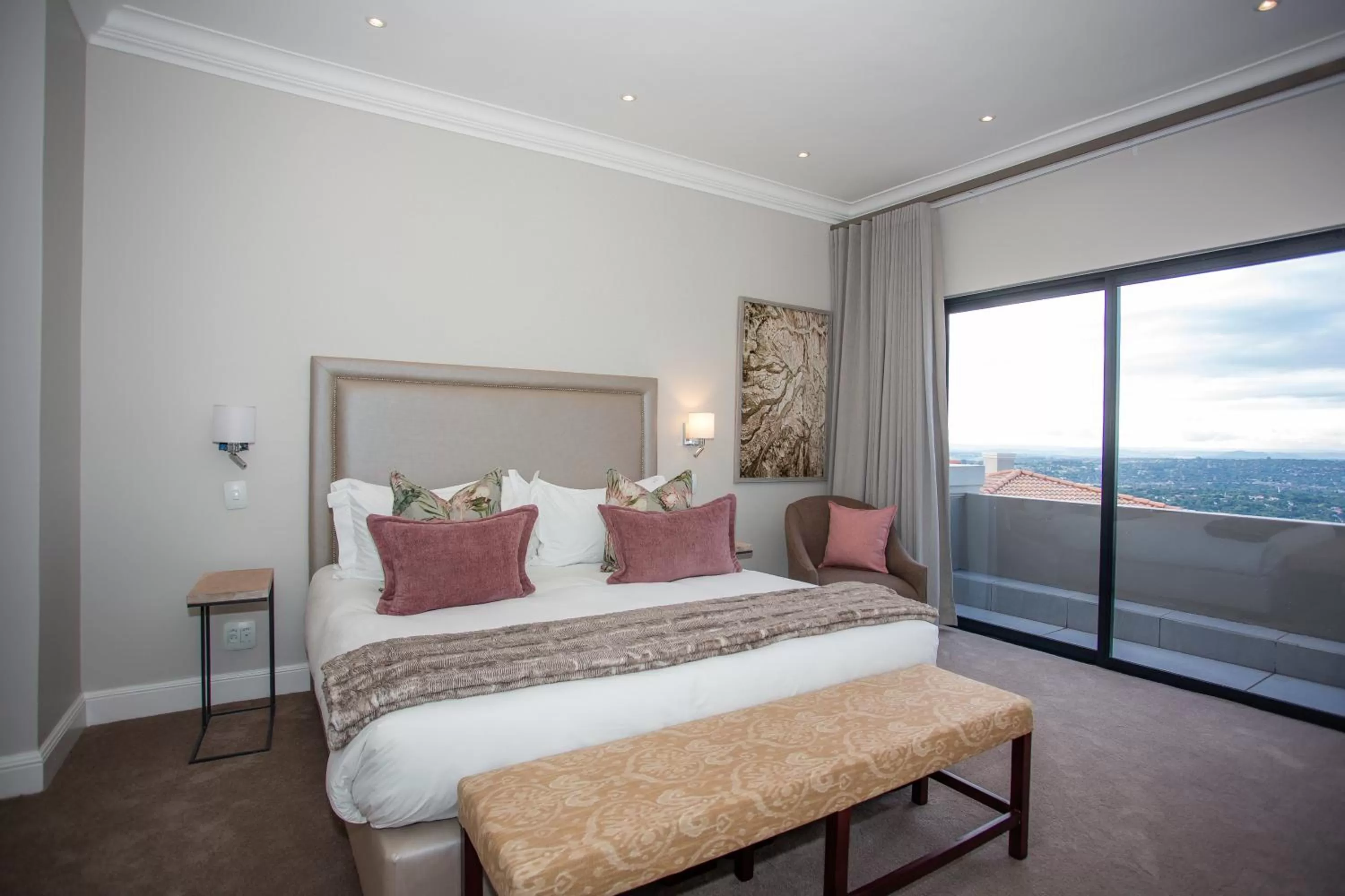 Bed in The Northcliff Boutique Hotel