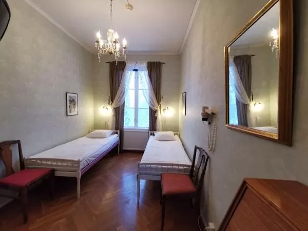 Photo of the whole room, Bed in Ulfshyttans Herrgård, nära Romme Alpin