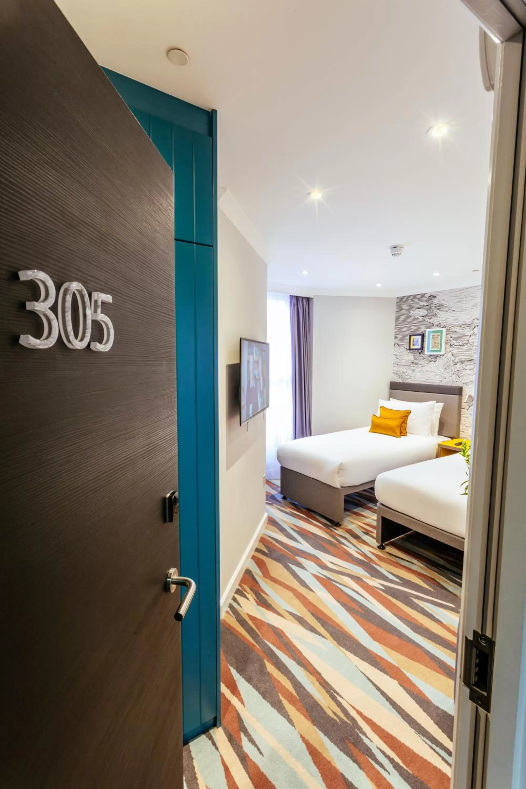 Decorative detail, Bed in Oliver Plaza Hotel