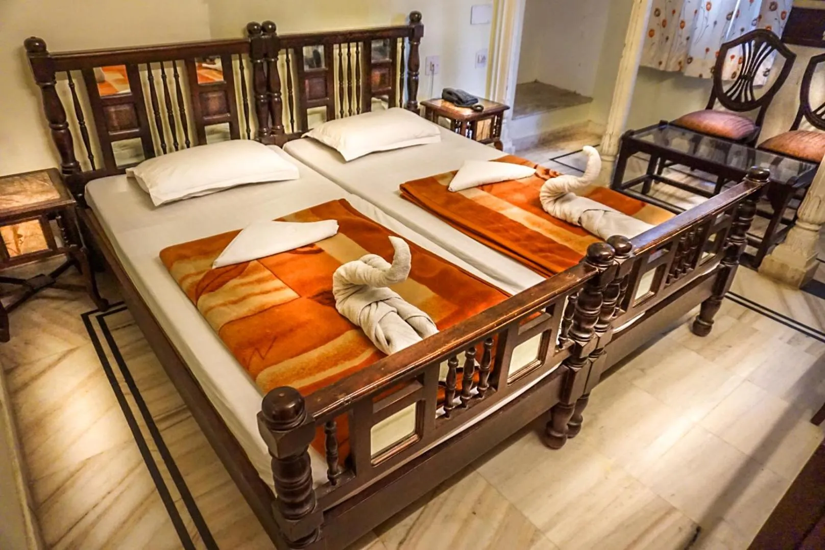 Bed in Krishna Palace - A Heritage Boutique Hotel