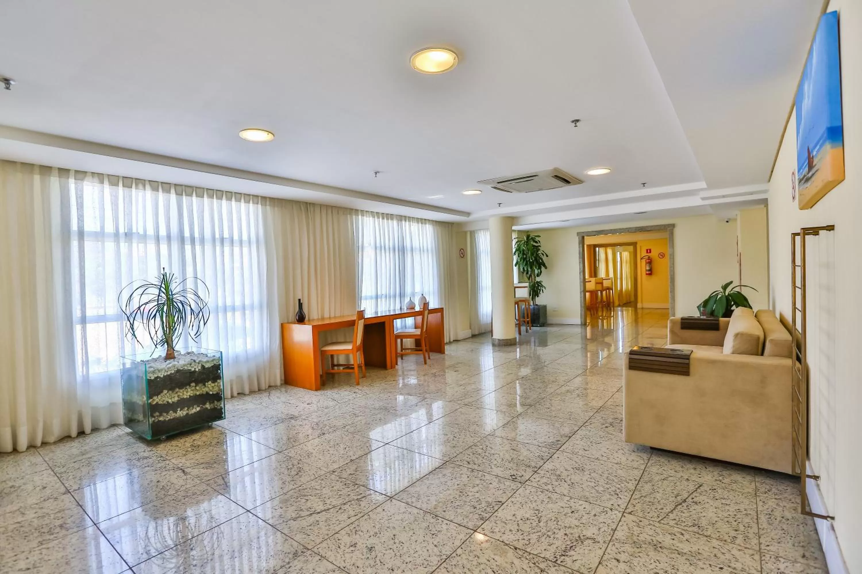 Lobby or reception in Dubai Macaé by Atlântica