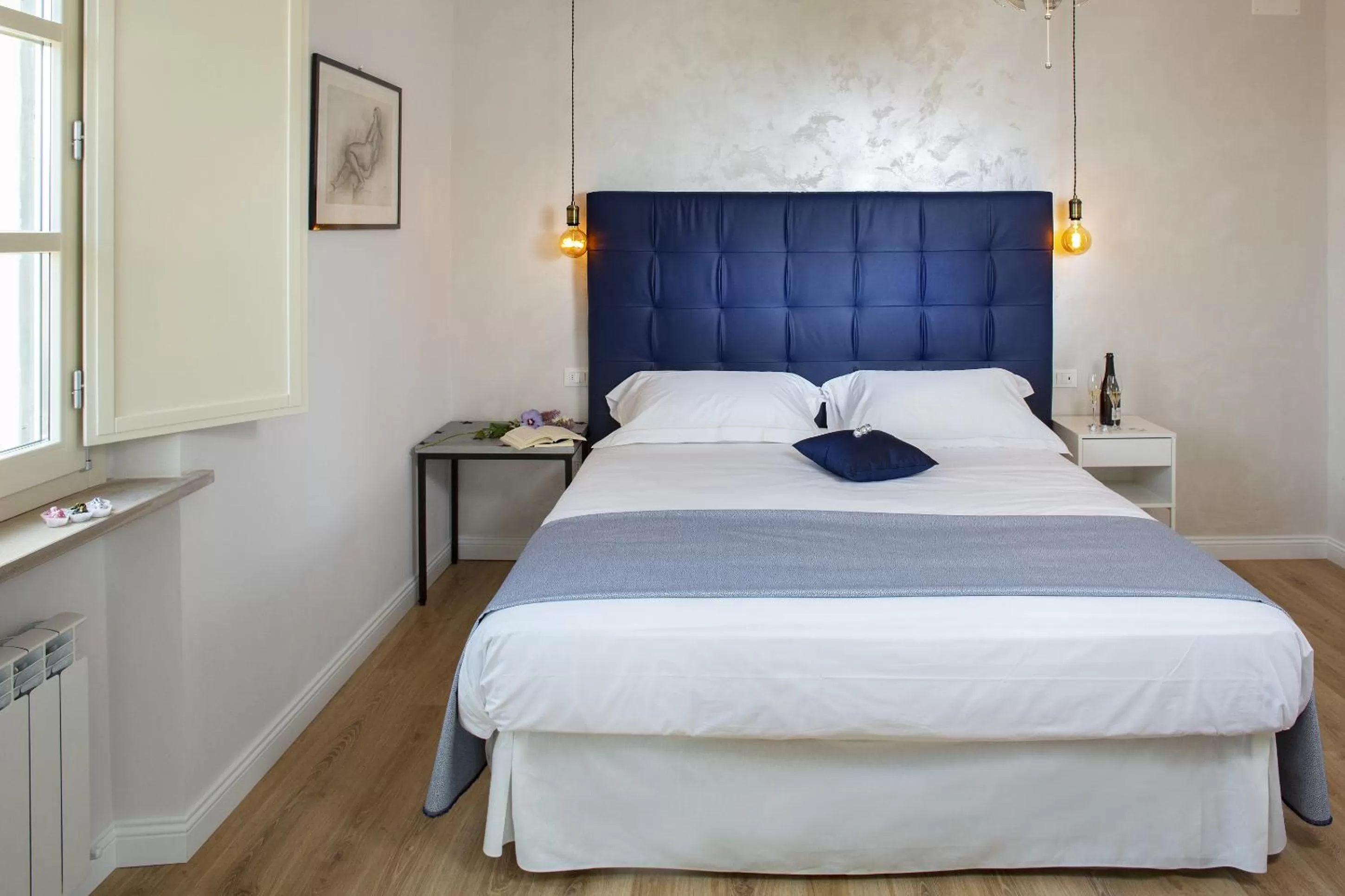 Bed in CorteViva Boutique B&B