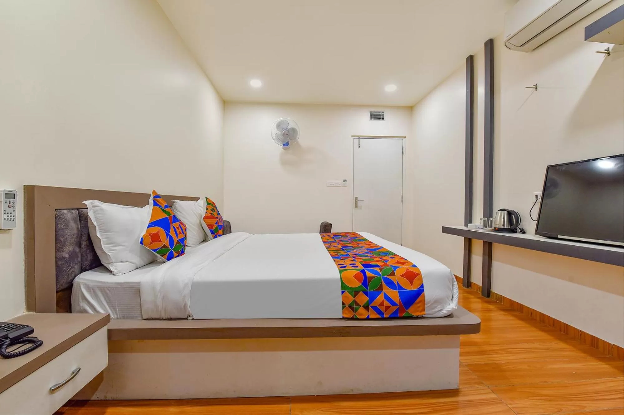 Bed in FabHotel Prime Rudra