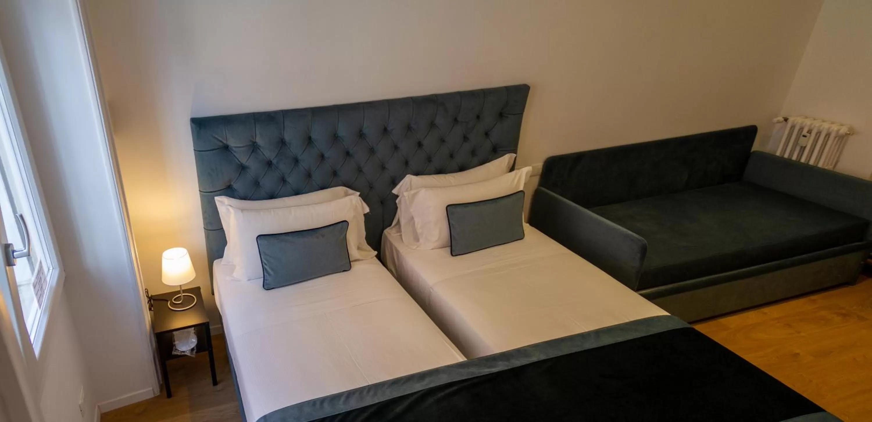 Bed in Michelangelo Vatican Rooms