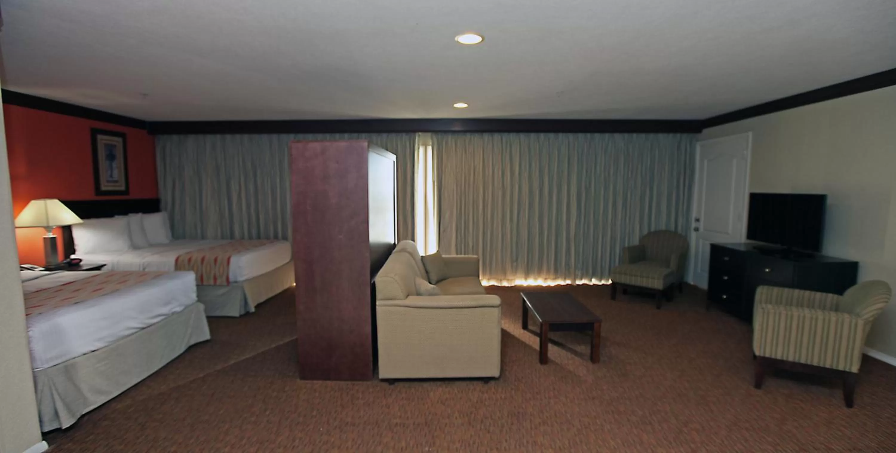 Living room, Bed in Days Inn by Wyndham Ocean City Oceanfront
