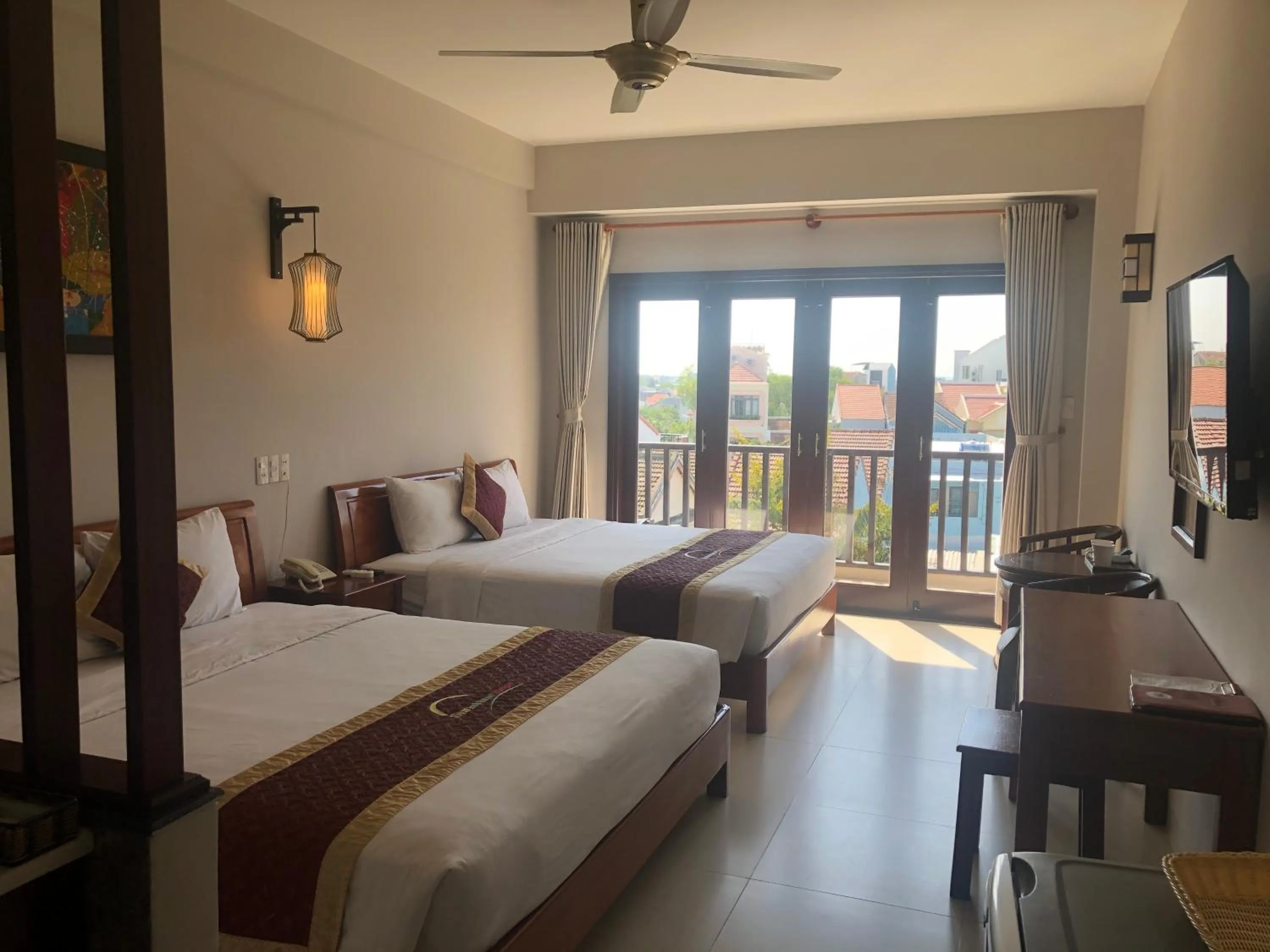 Bed in Sunshine Hoian Hotel