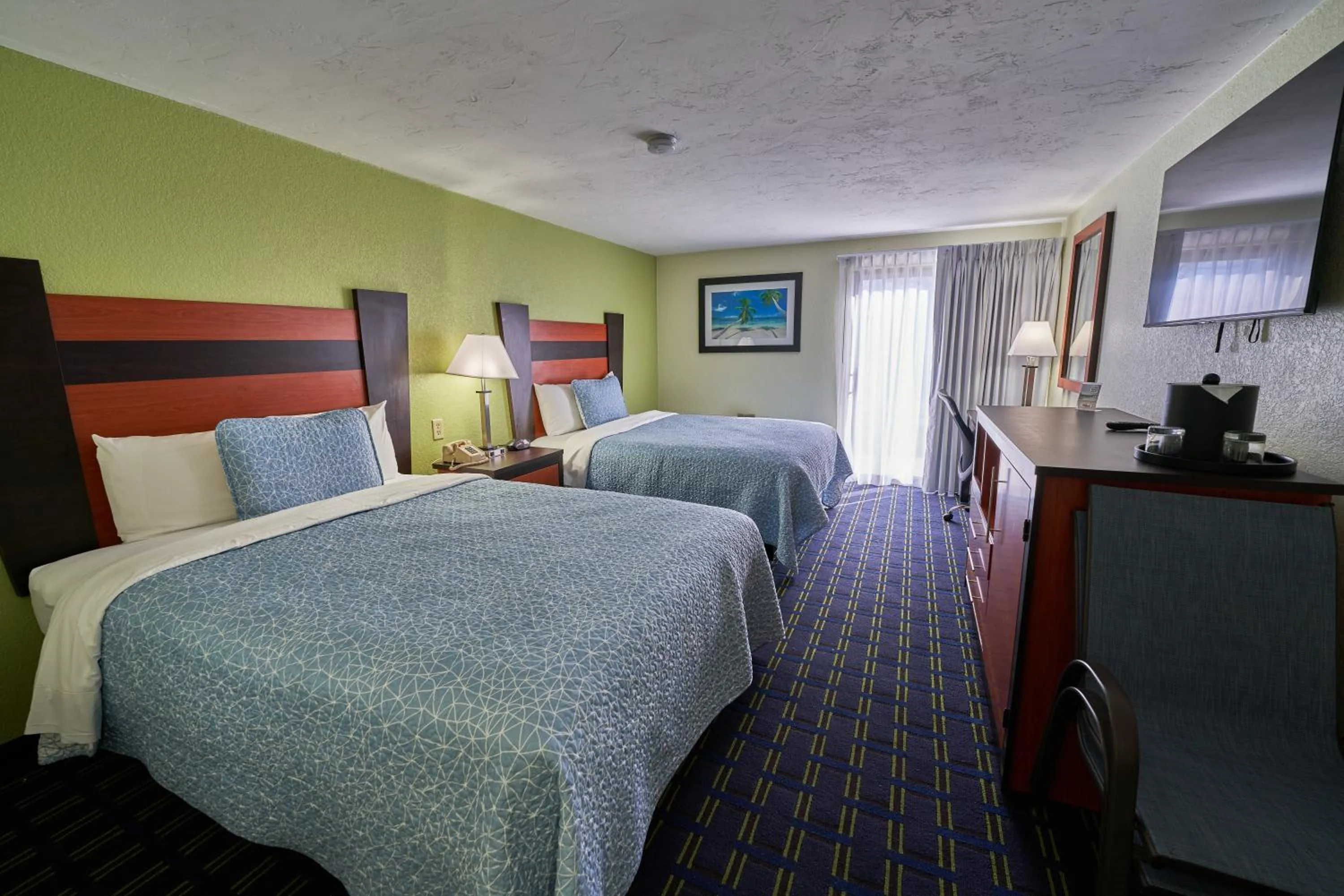 Photo of the whole room, Bed in The Mariner Resort Cape Cod by The Red Collection