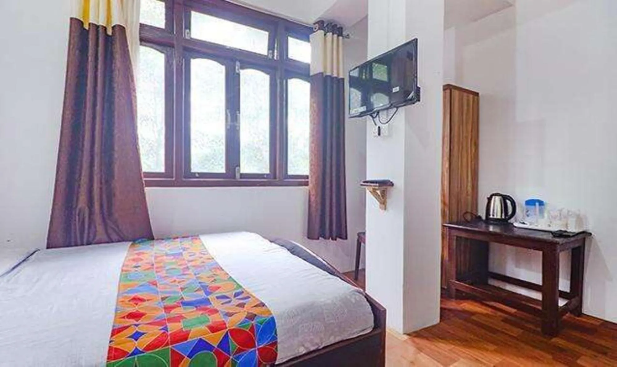 Bed in FabExpress Laxmi Niwas