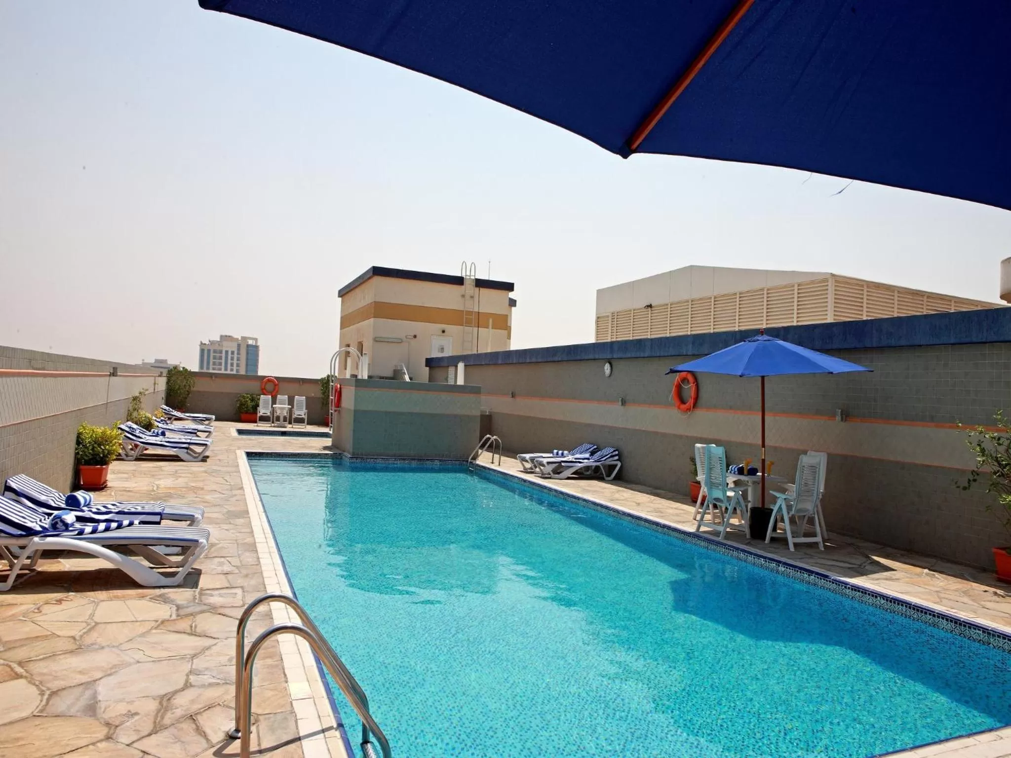 Swimming pool in Rose Garden Hotel Apartments - Al Barsha, Near Metro Station