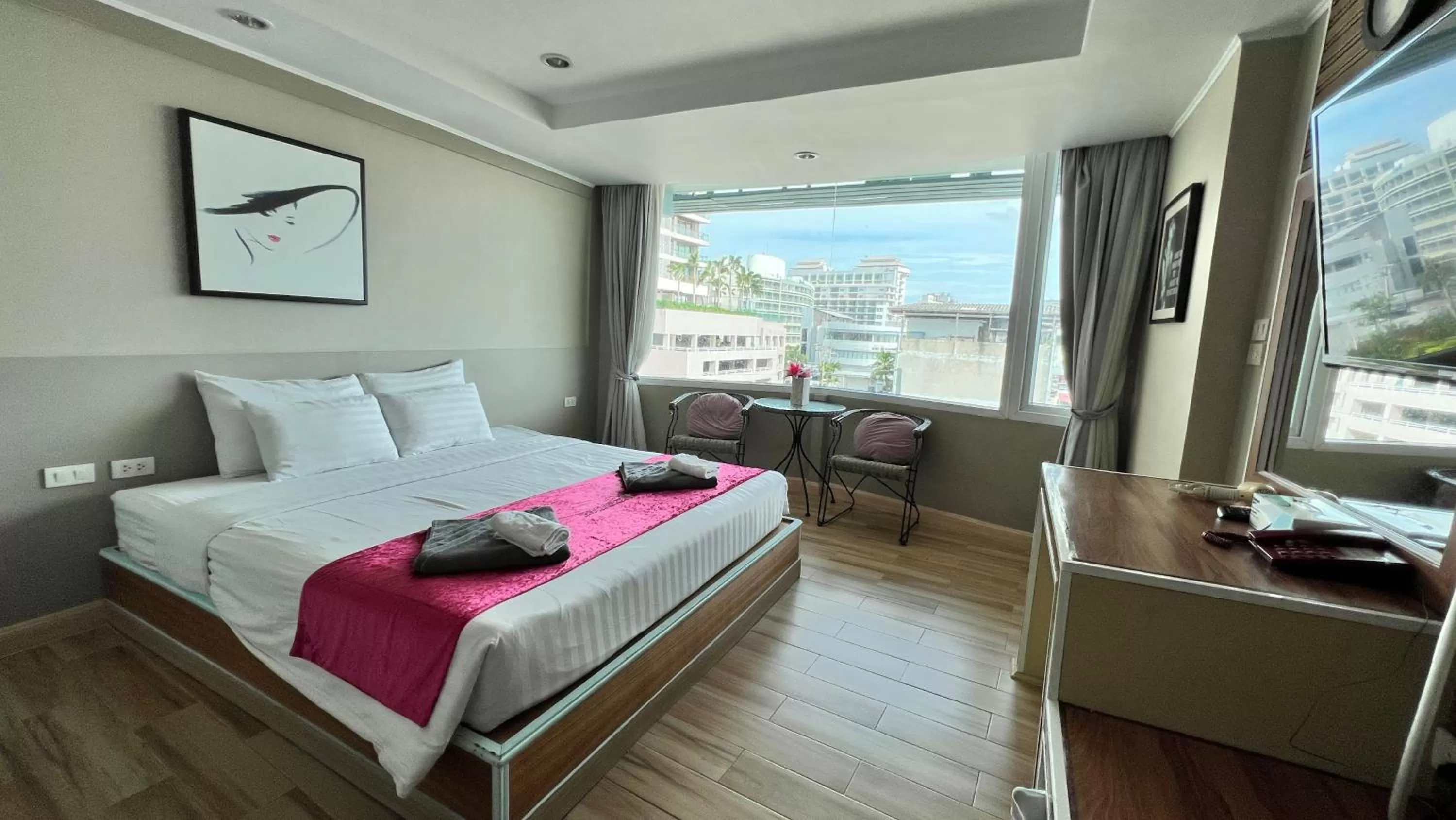 Bed in The Beach Front Resort, Pattaya