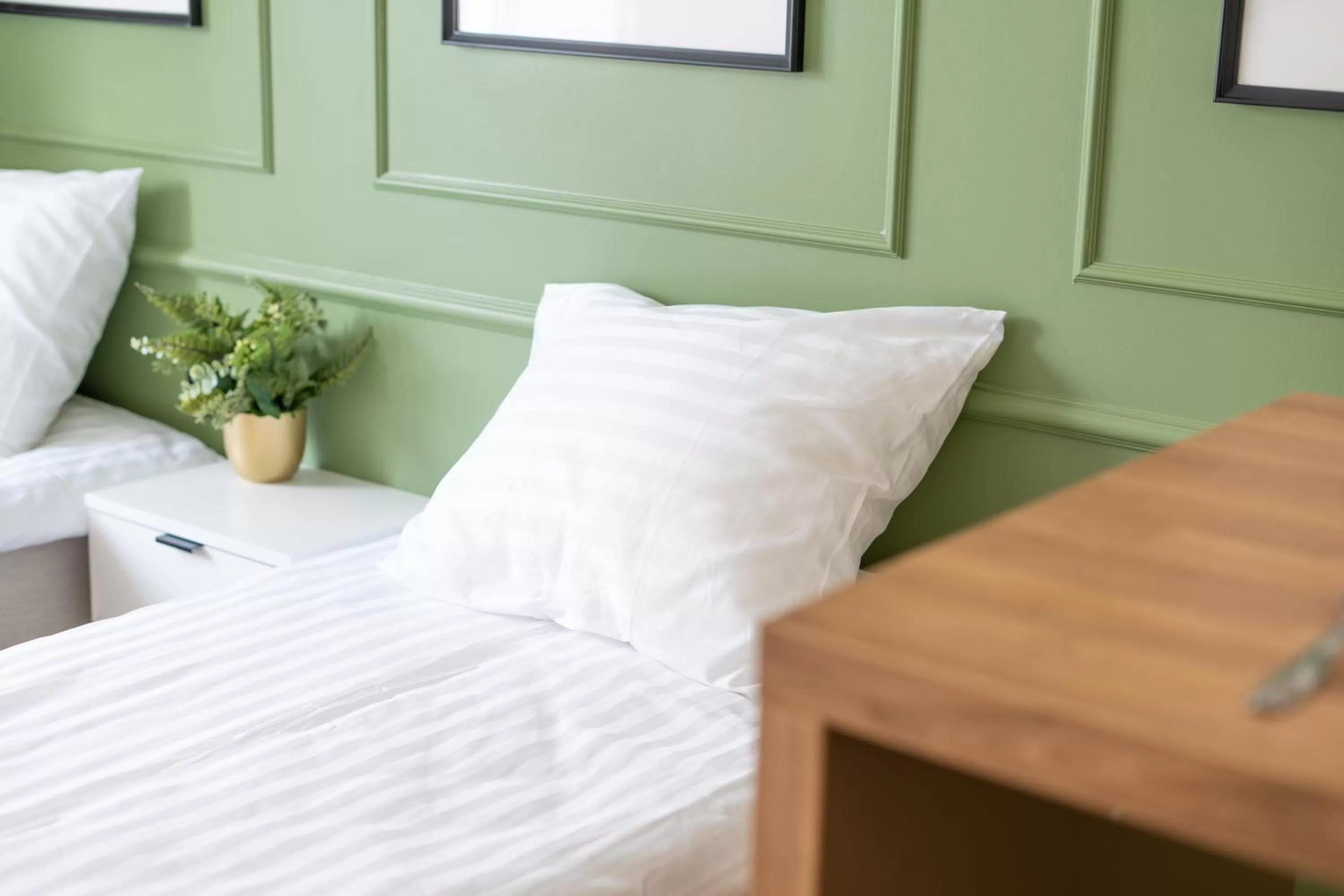 Bed in Oasis Airport Studios by RevalHome