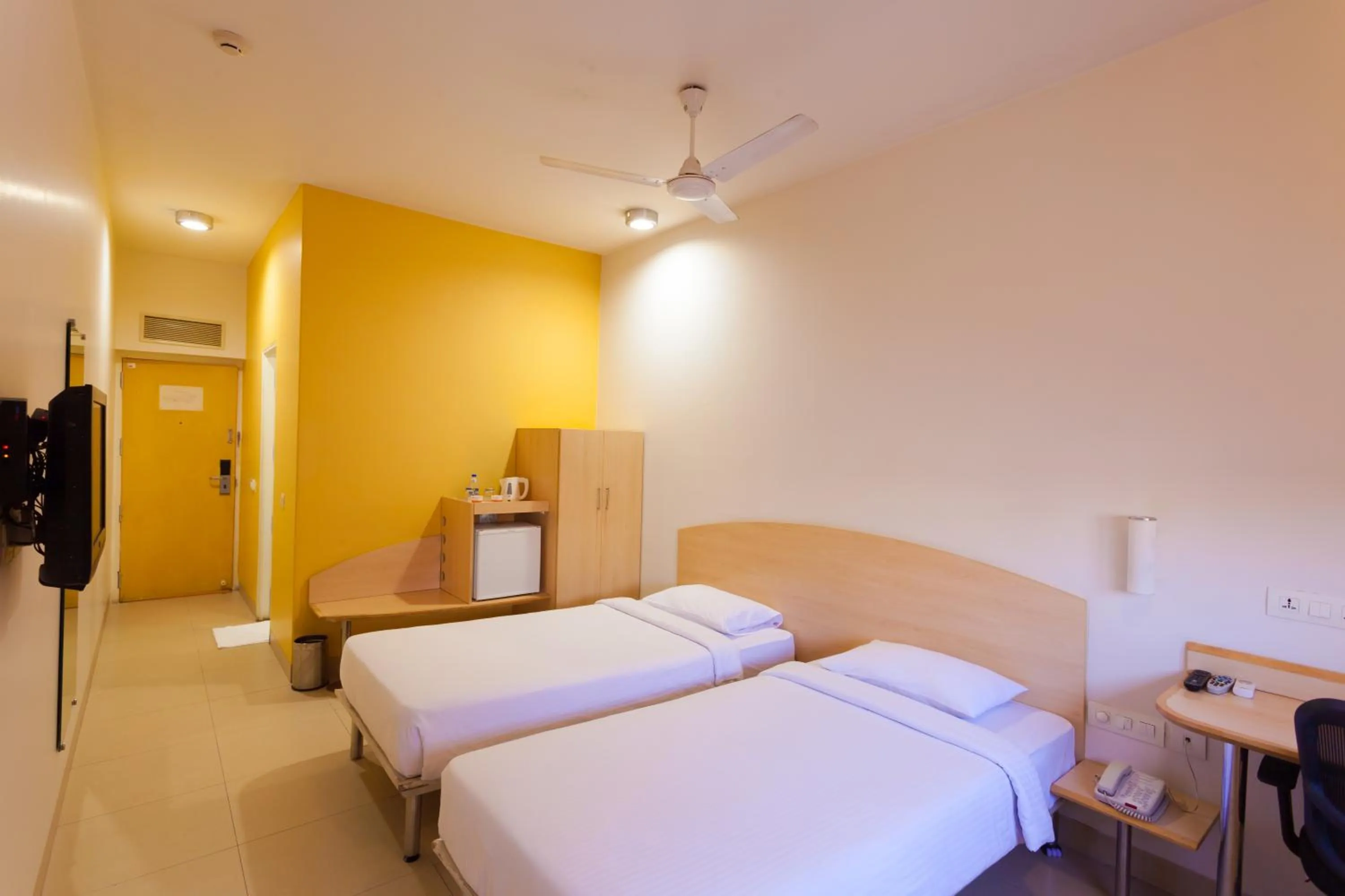 Photo of the whole room, Bed in Ginger Mangalore