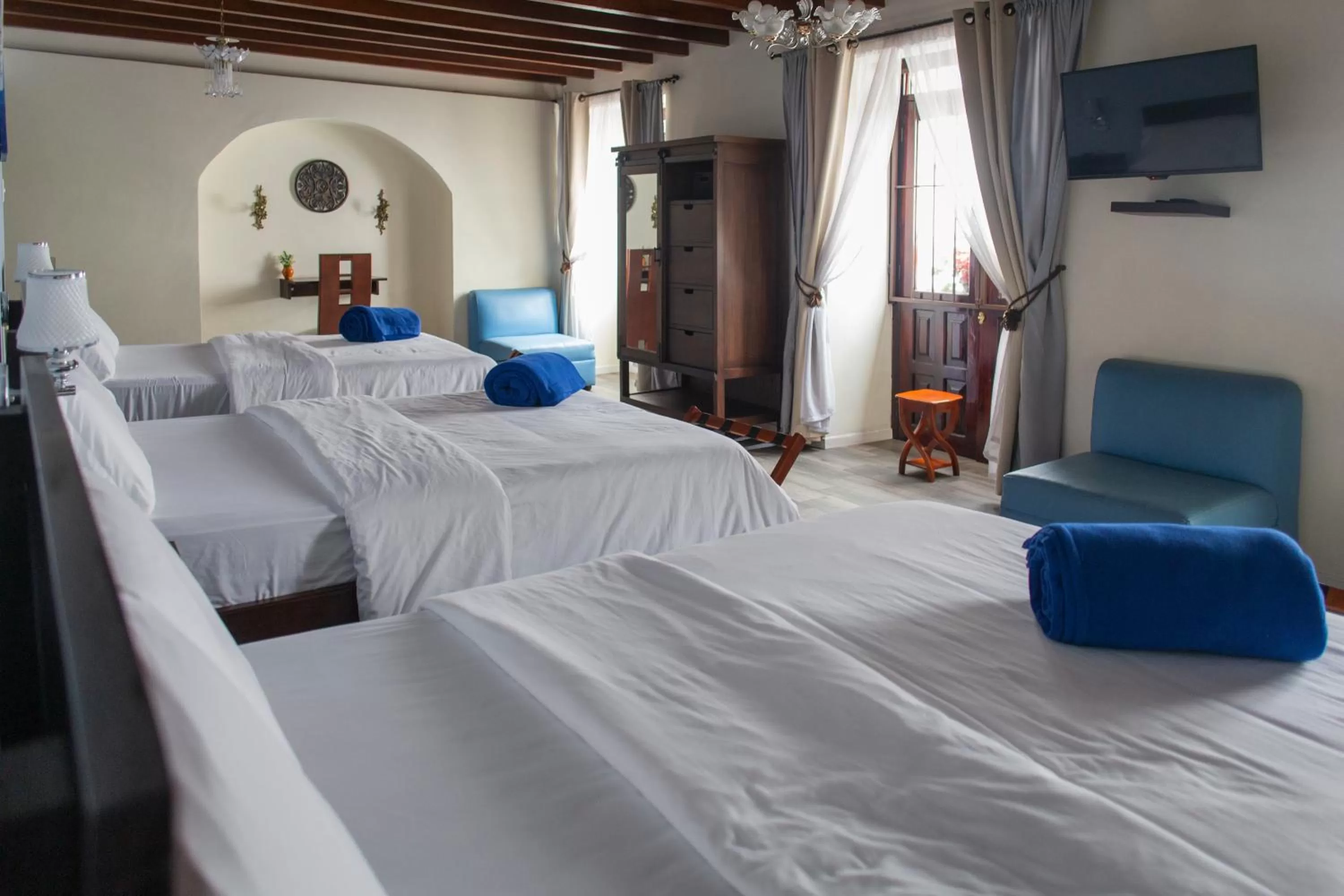 Bed in Hotel Colonial San Agustin