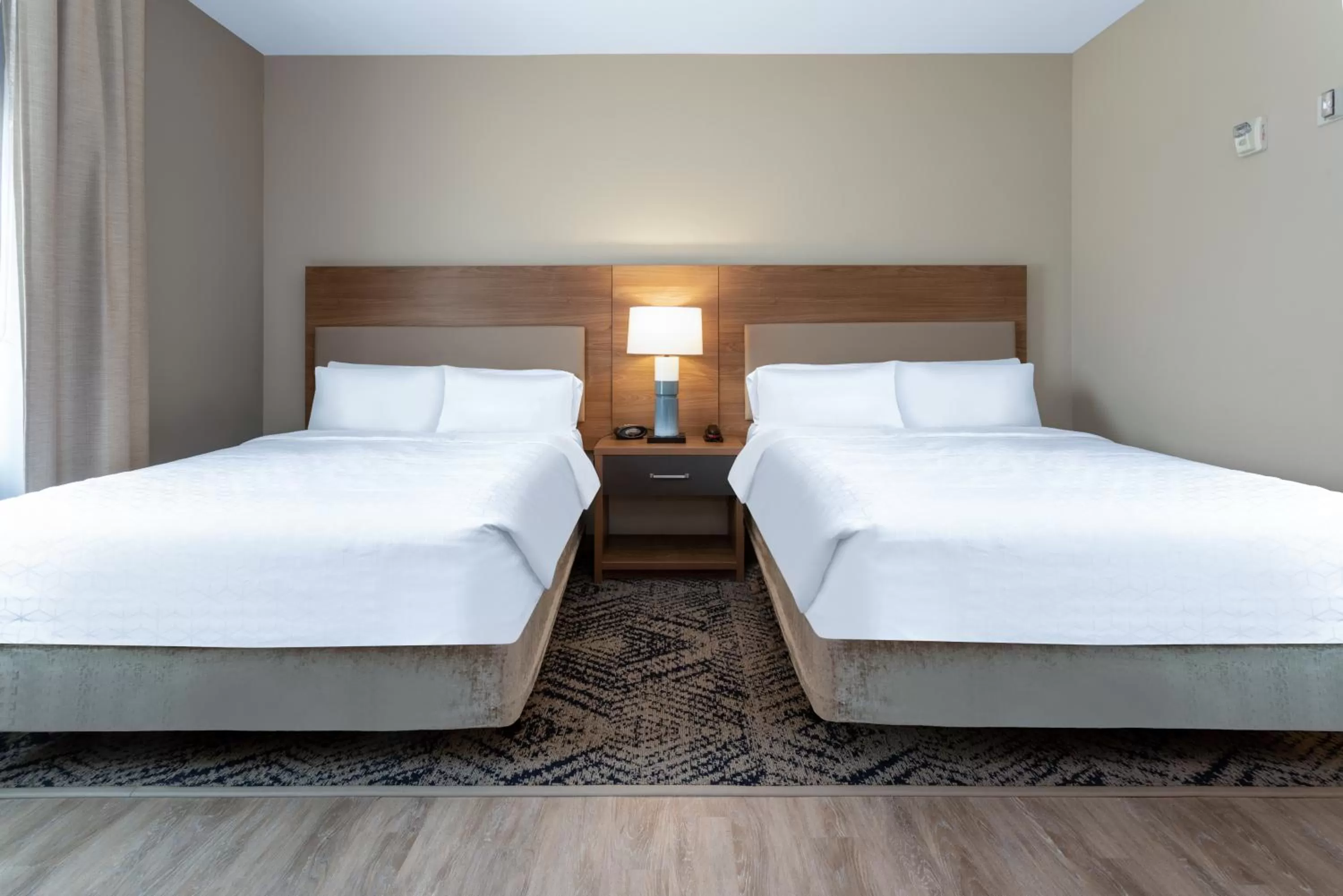 Bed in Candlewood Suites Grand Junction by IHG