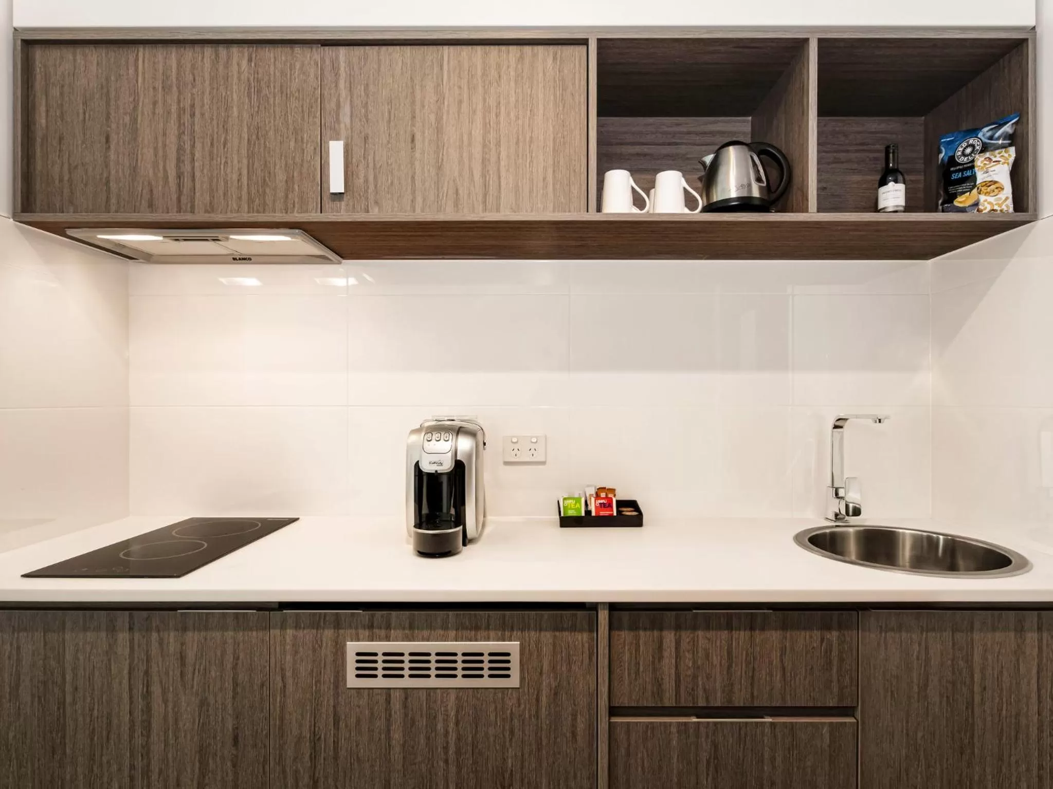 kitchen in Mercure Sunshine Coast Kawana Waters