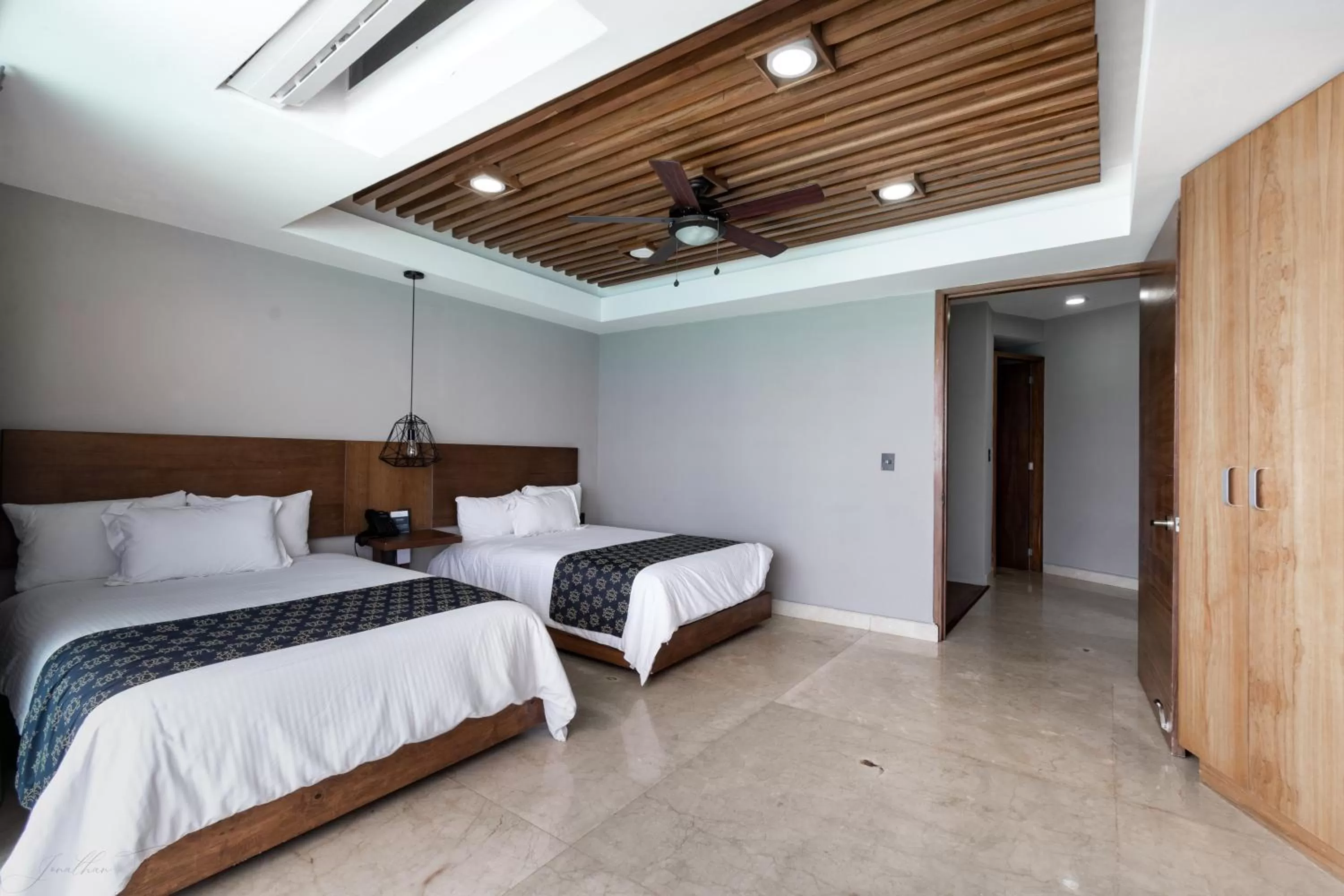 Bed in Ocean Dream Cancun by GuruHotel