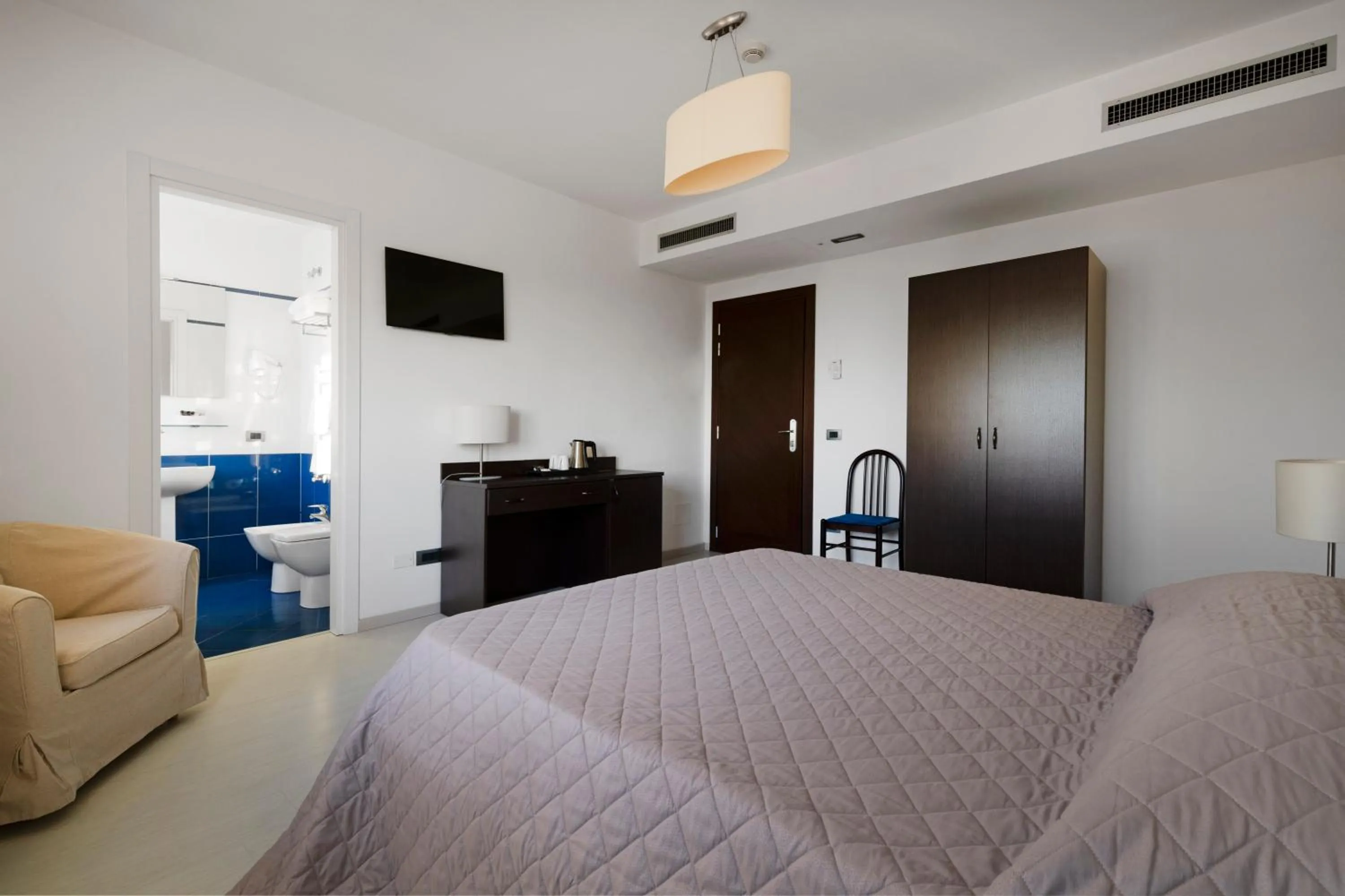 Bed in Hotel Sorriso