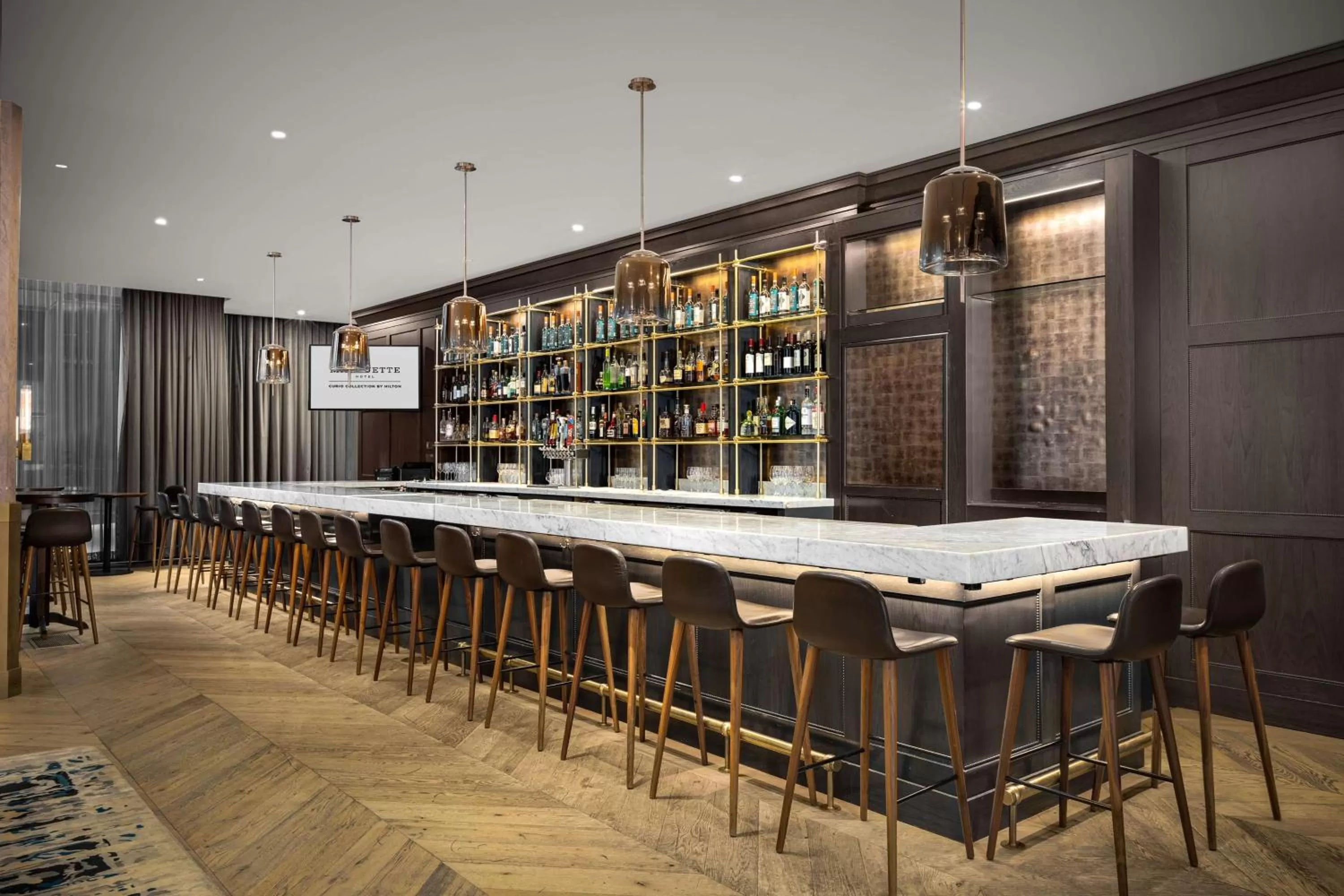 Lounge or bar in The Marquette Hotel, Curio Collection by Hilton