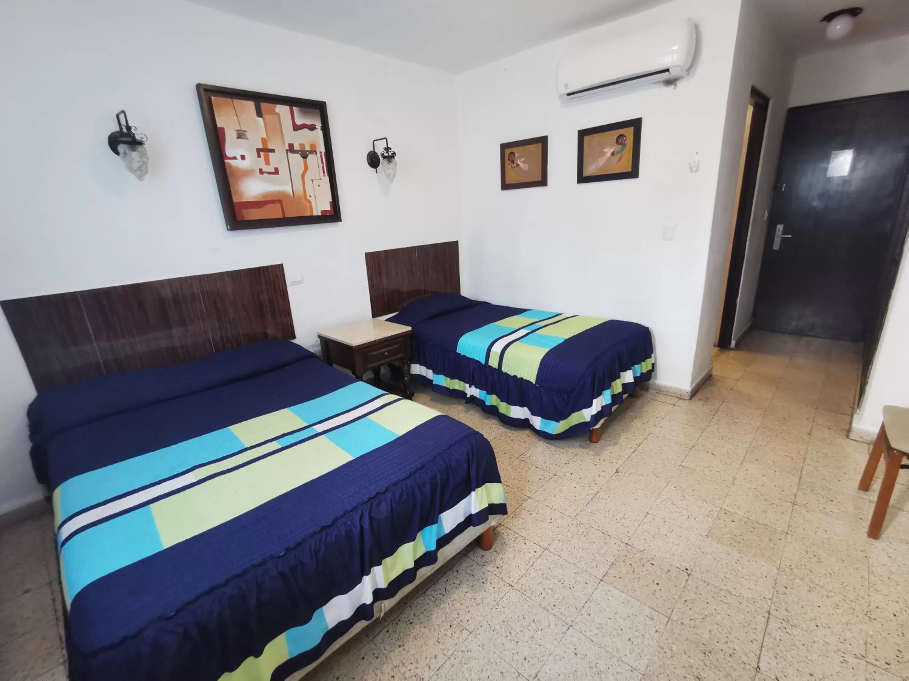 Bed in Hotel Las Dalias Inn