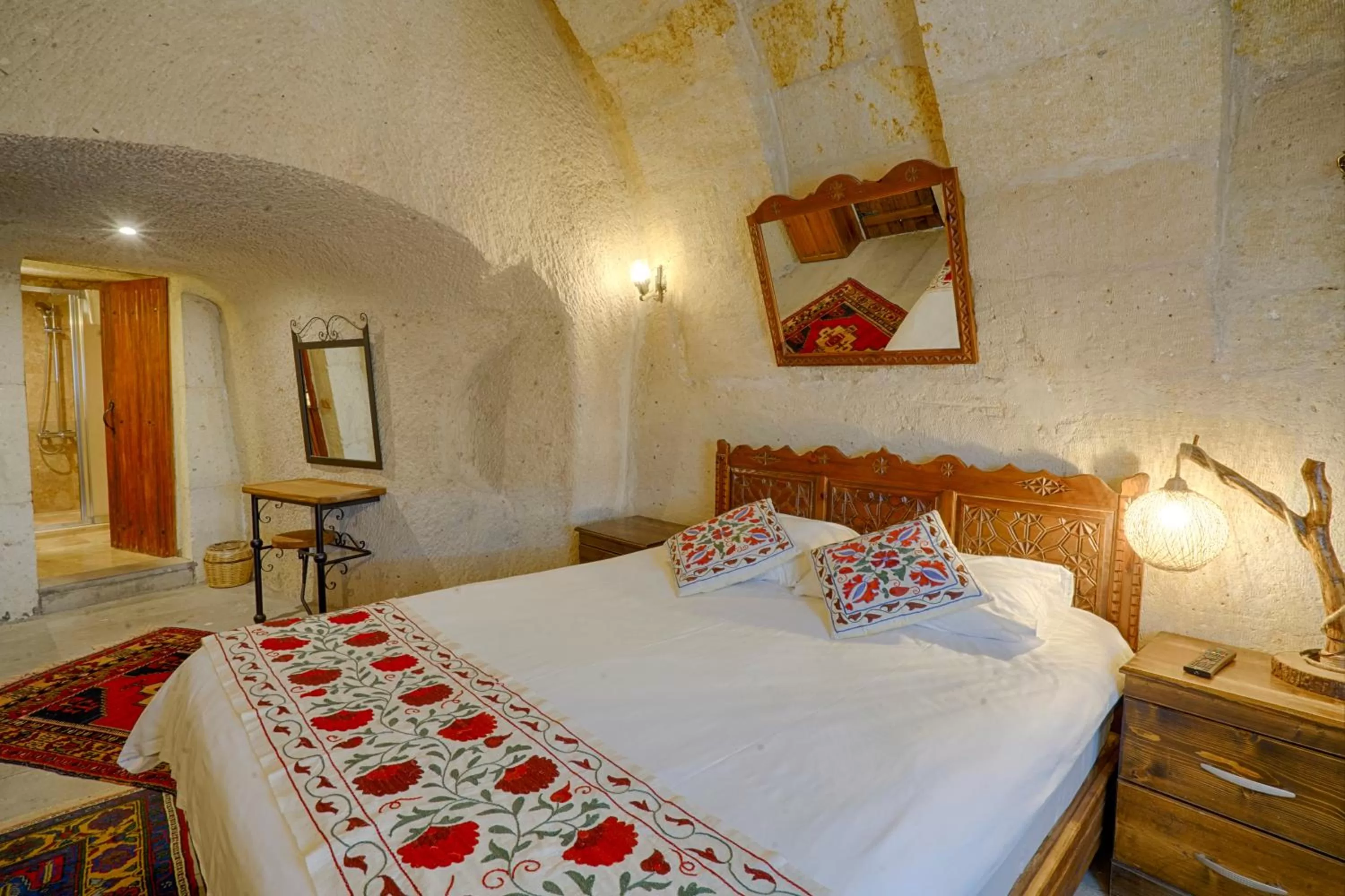 Bed in Tulip Cave Suites
