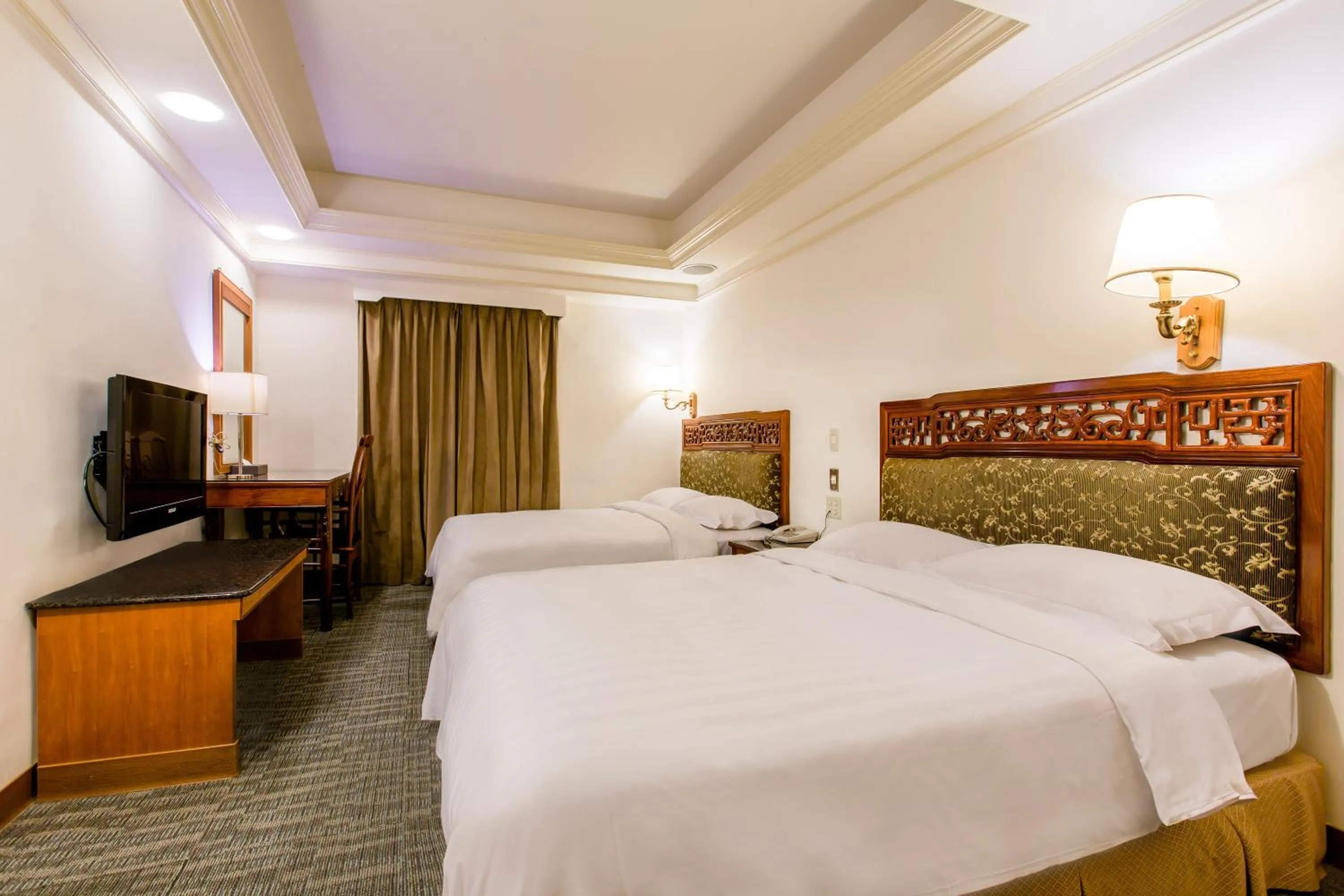 Bed in Kingshi Hotel