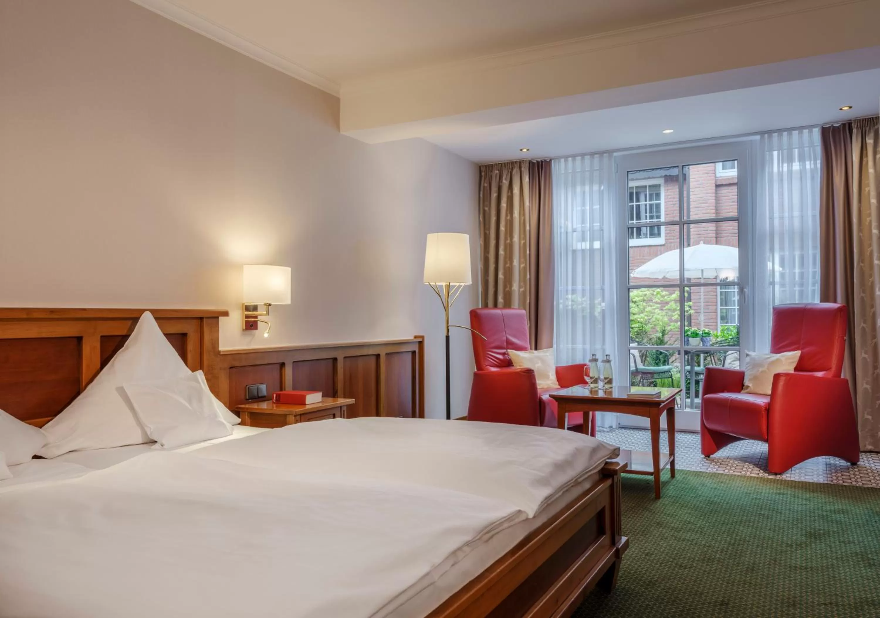 Photo of the whole room, Bed in Romantik Hotel Jagdhaus Eiden am See