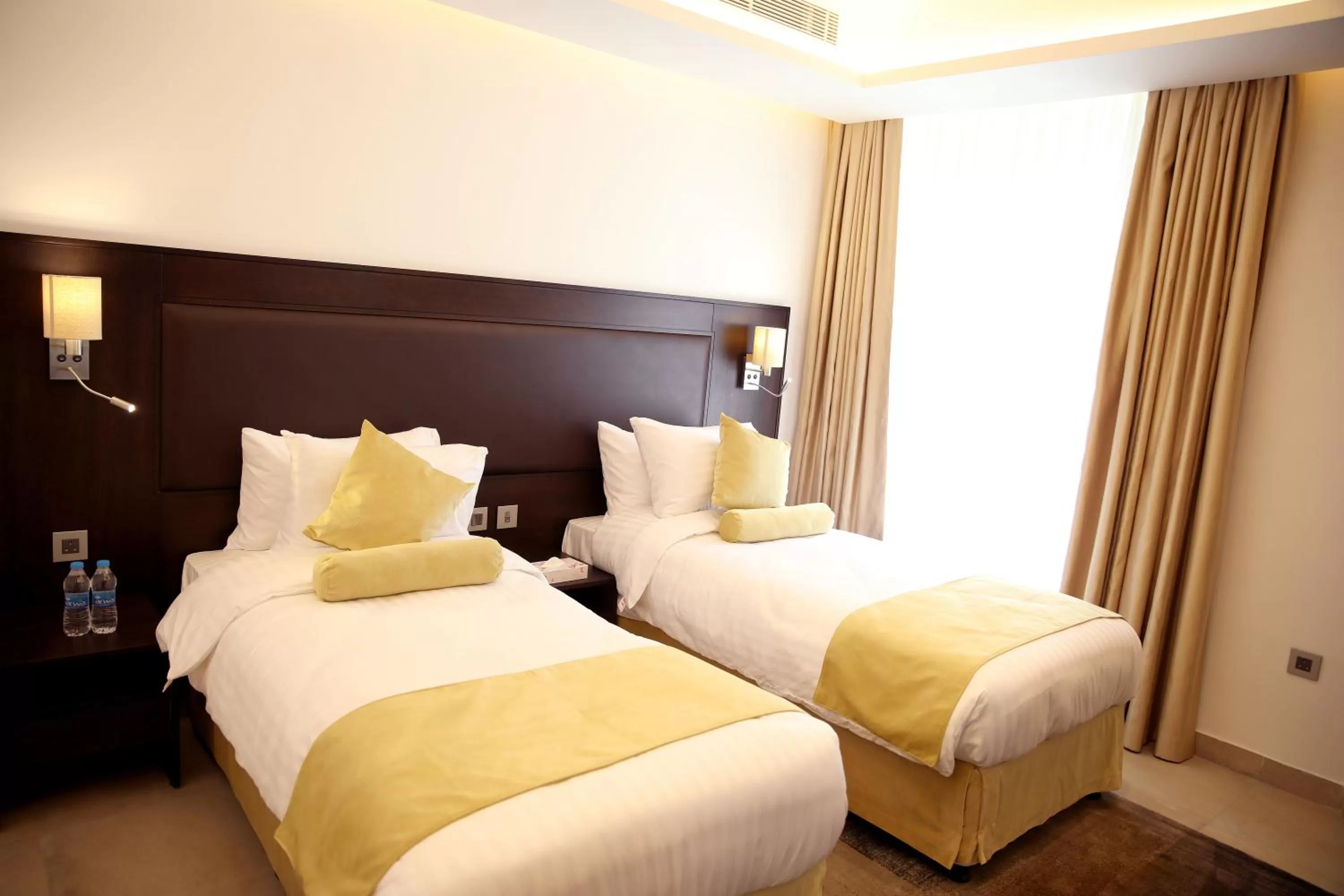 Bed in Downtown Hotel Apartments