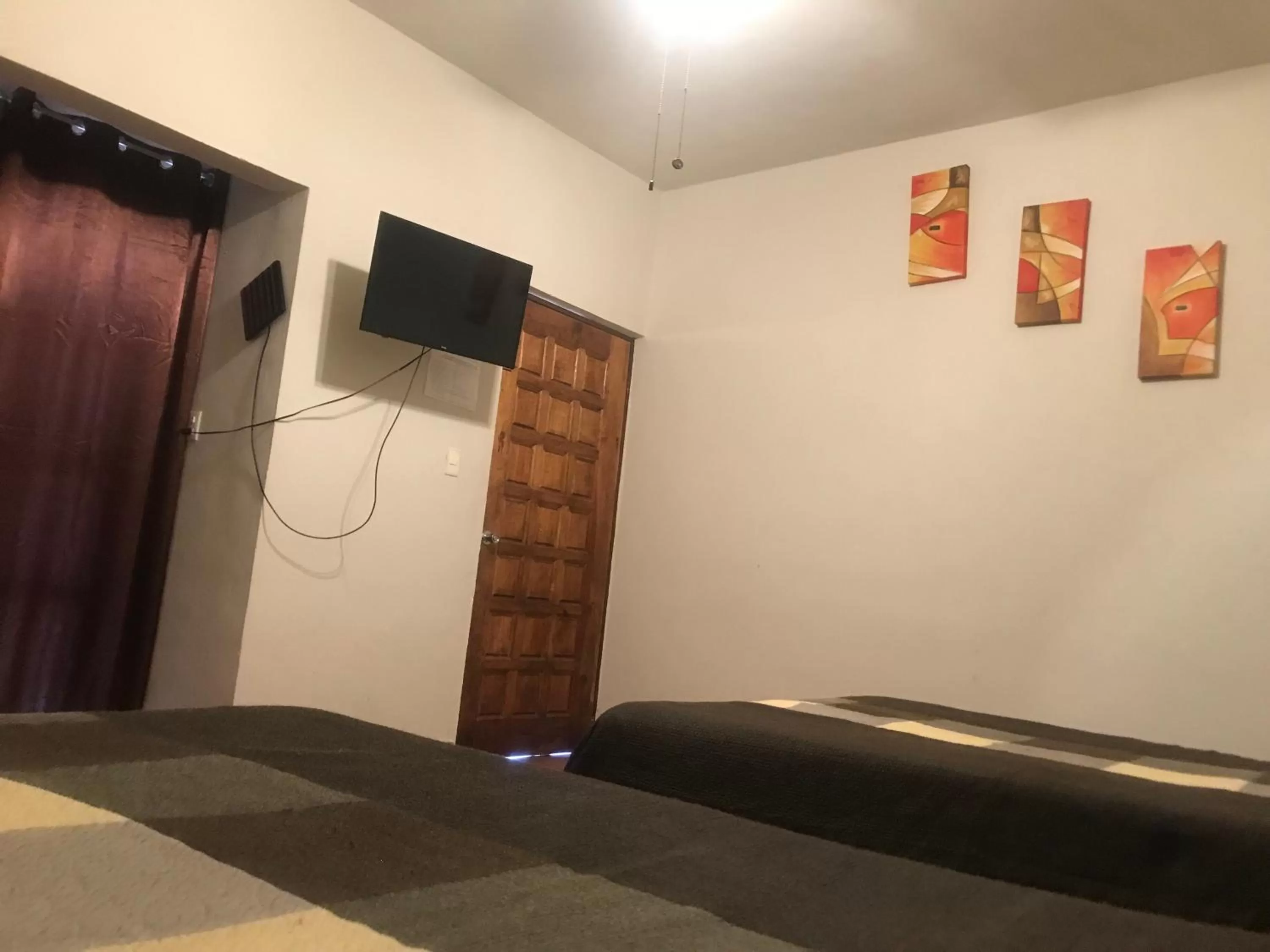 TV/Entertainment Center in La Ilusión Hotel Campestre y Balneario