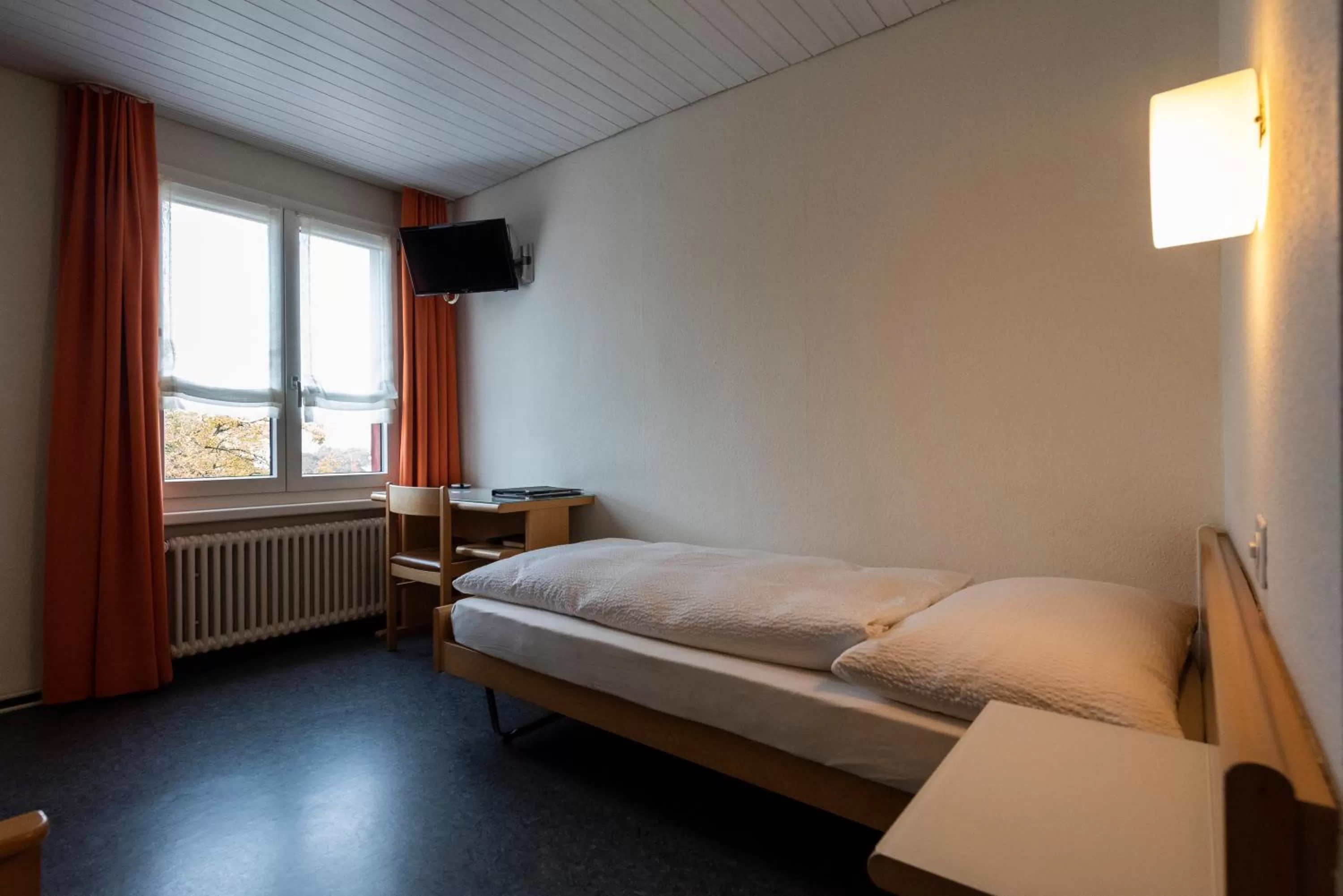 Photo of the whole room, Bed in Gasthof Pizzeria Weingarten