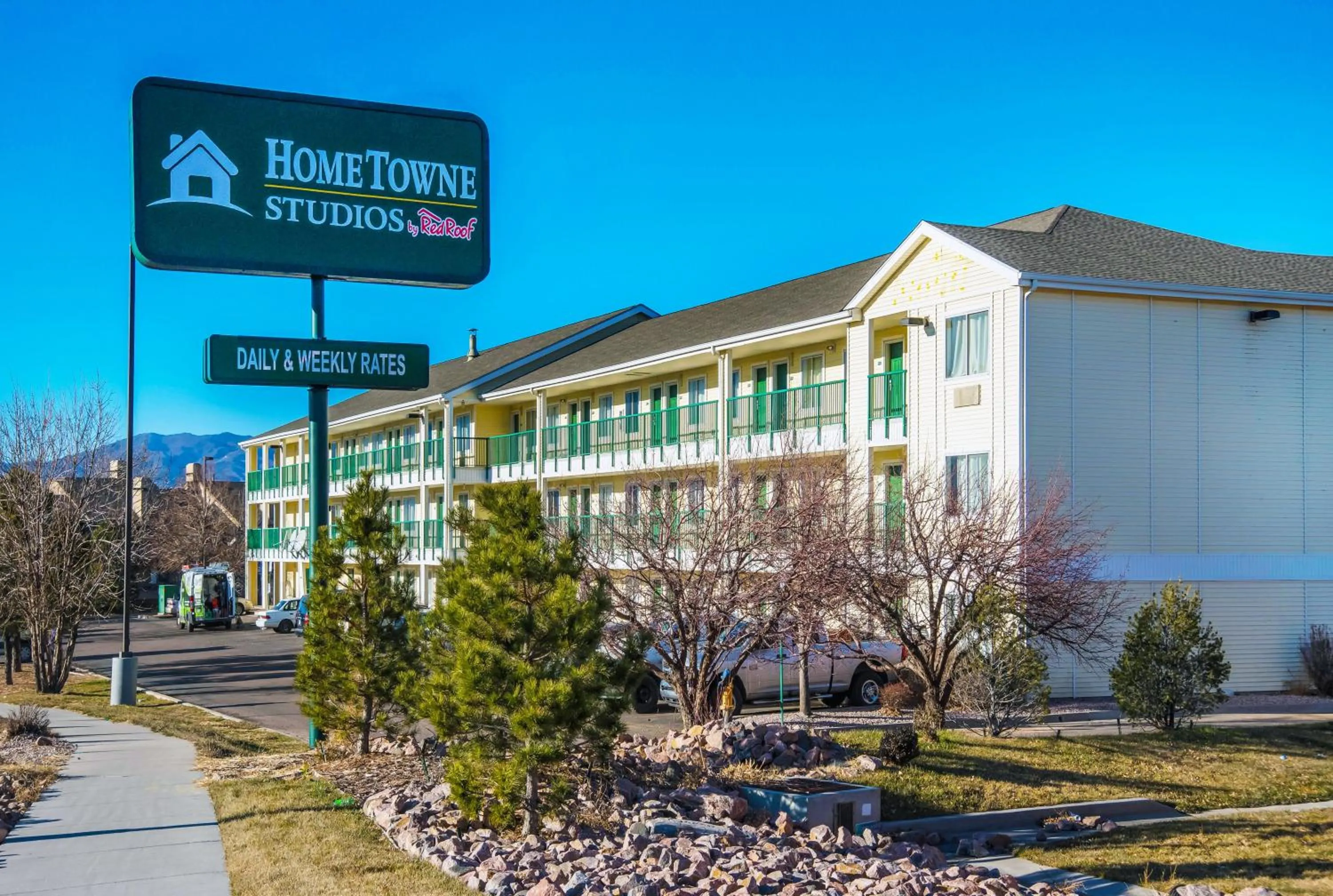 Property building in HomeTowne Studios by Red Roof Colorado Springs - Airport