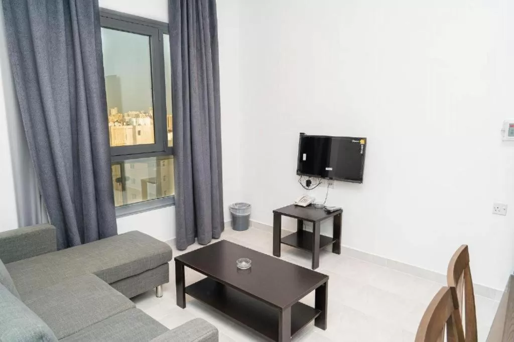 TV/Entertainment Center in Atlantis Suites Hotel