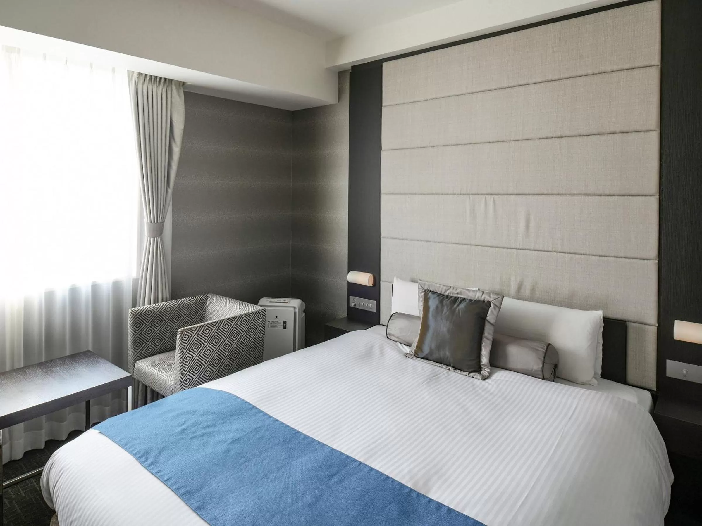 Bed in Vessel Inn Shigamoriyama Station