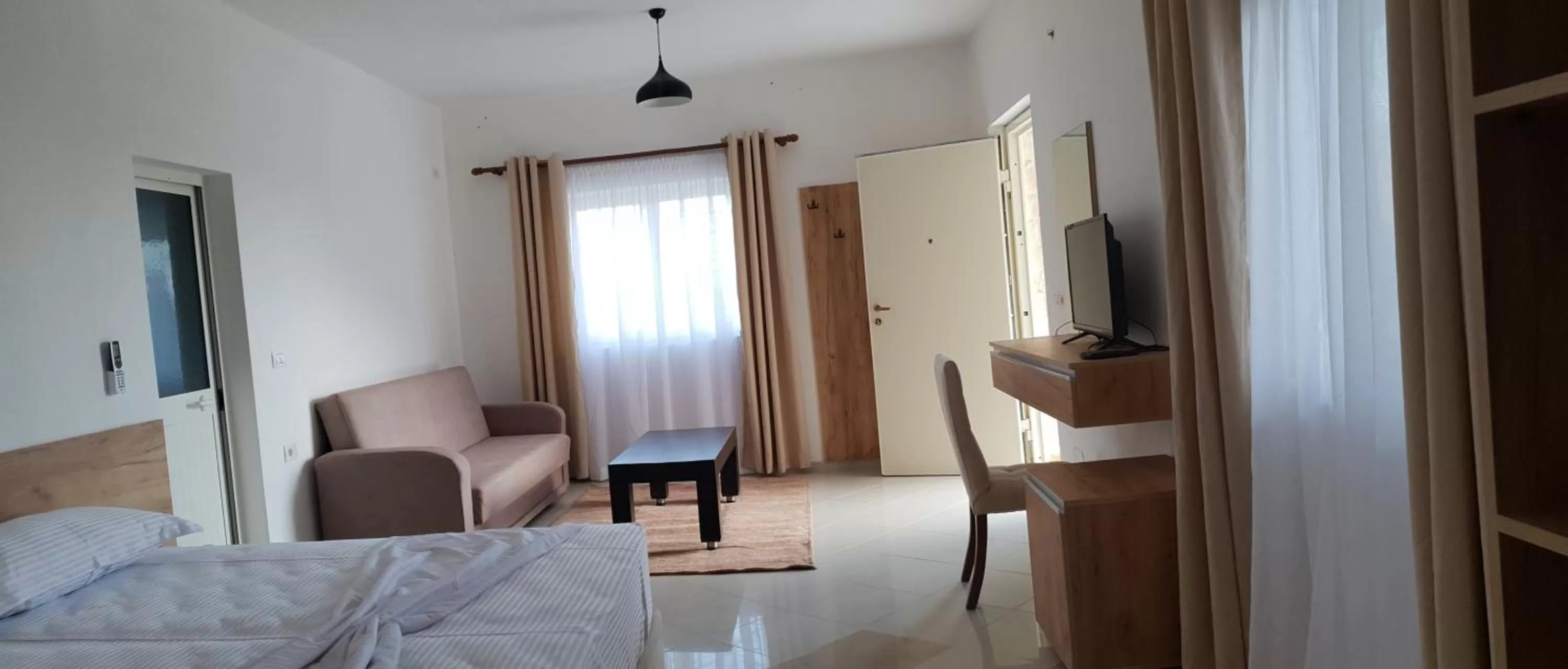 Bed, Seating Area in Hotel Grandpa's House