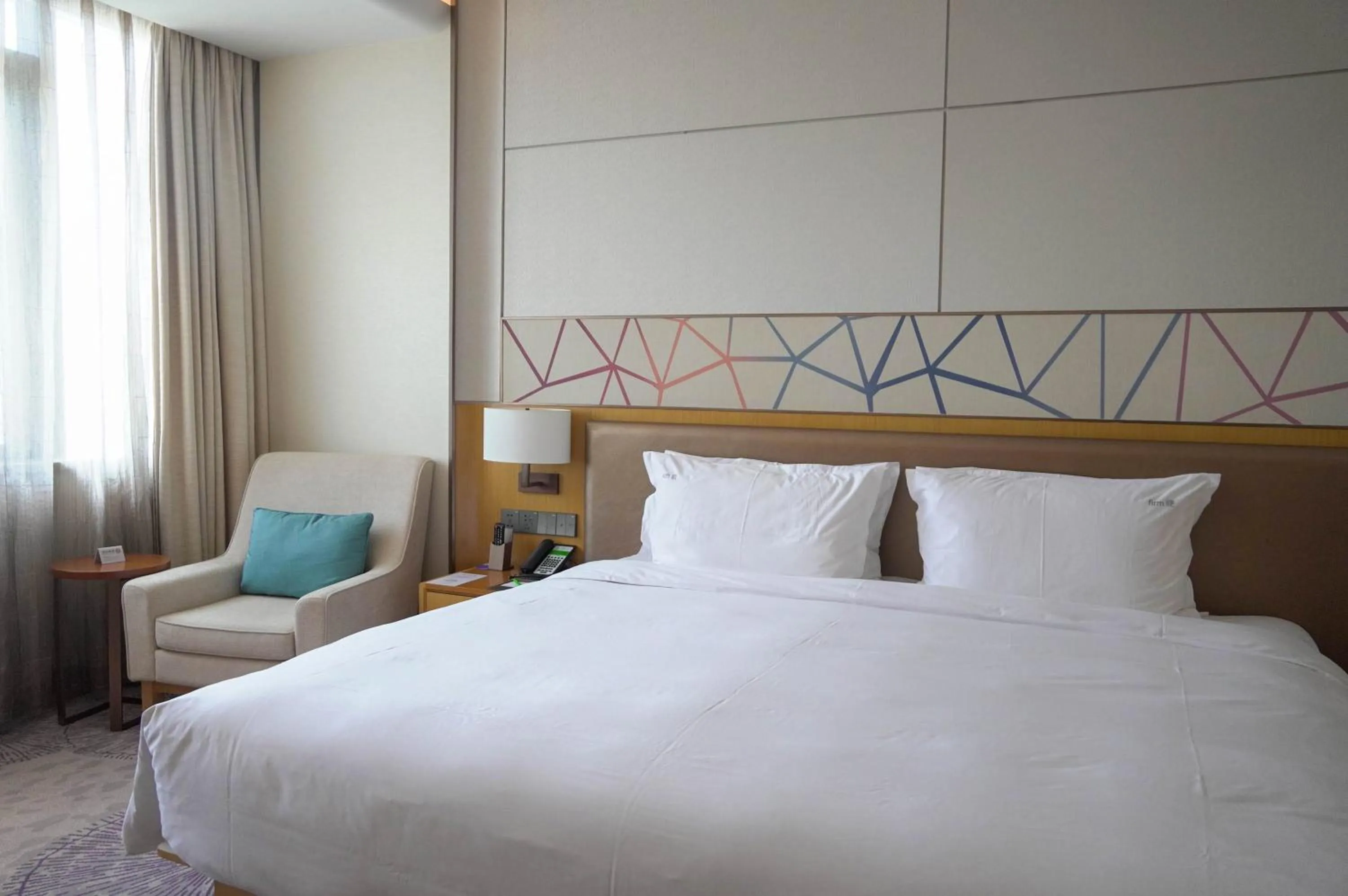 Bed in Holiday Inn Tianjin Xiqing by IHG