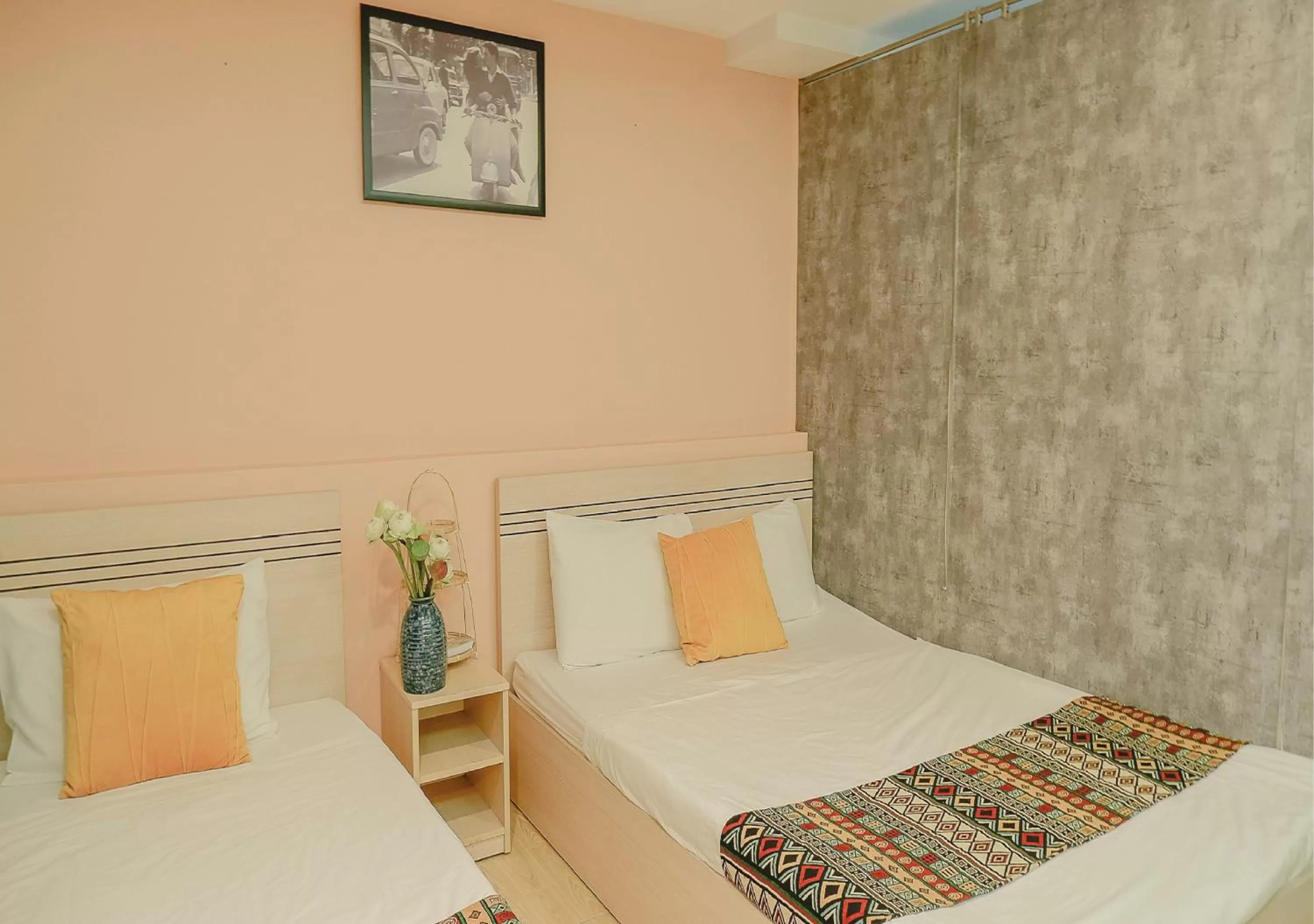 Bed in Galaxy Boutique Sai Gon Central Hotel