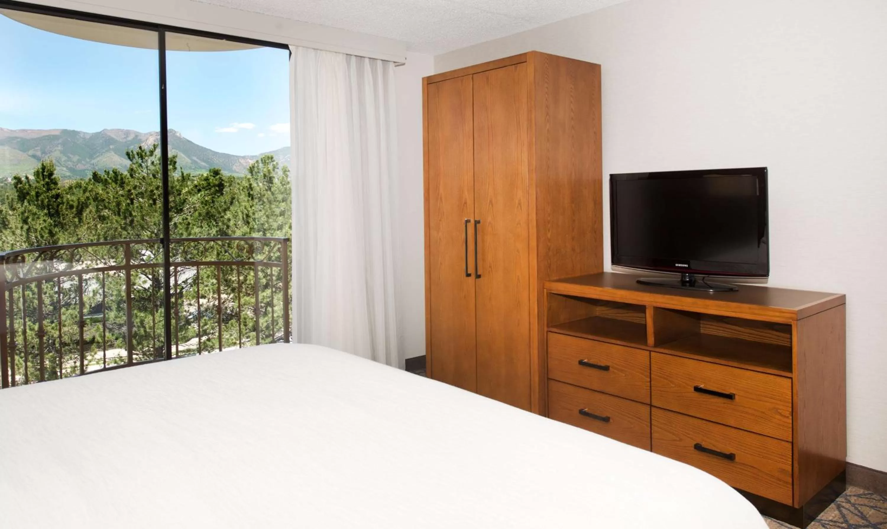 Bed in Embassy Suites by Hilton Colorado Springs