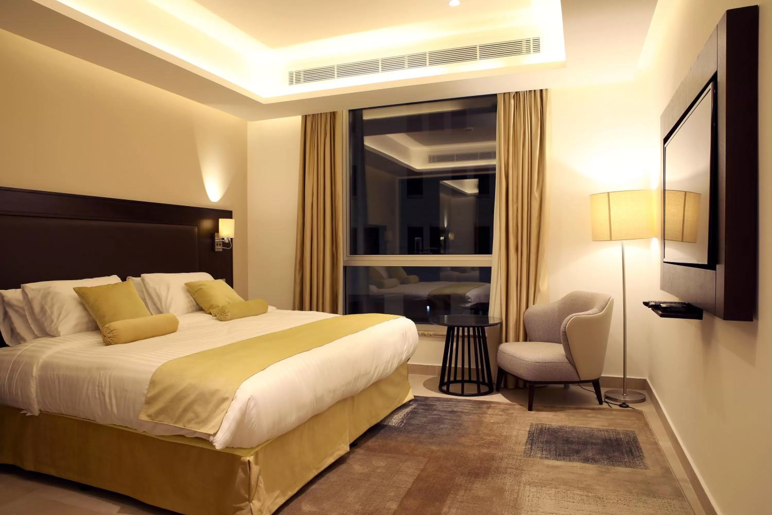 Bed in Downtown Hotel Apartments