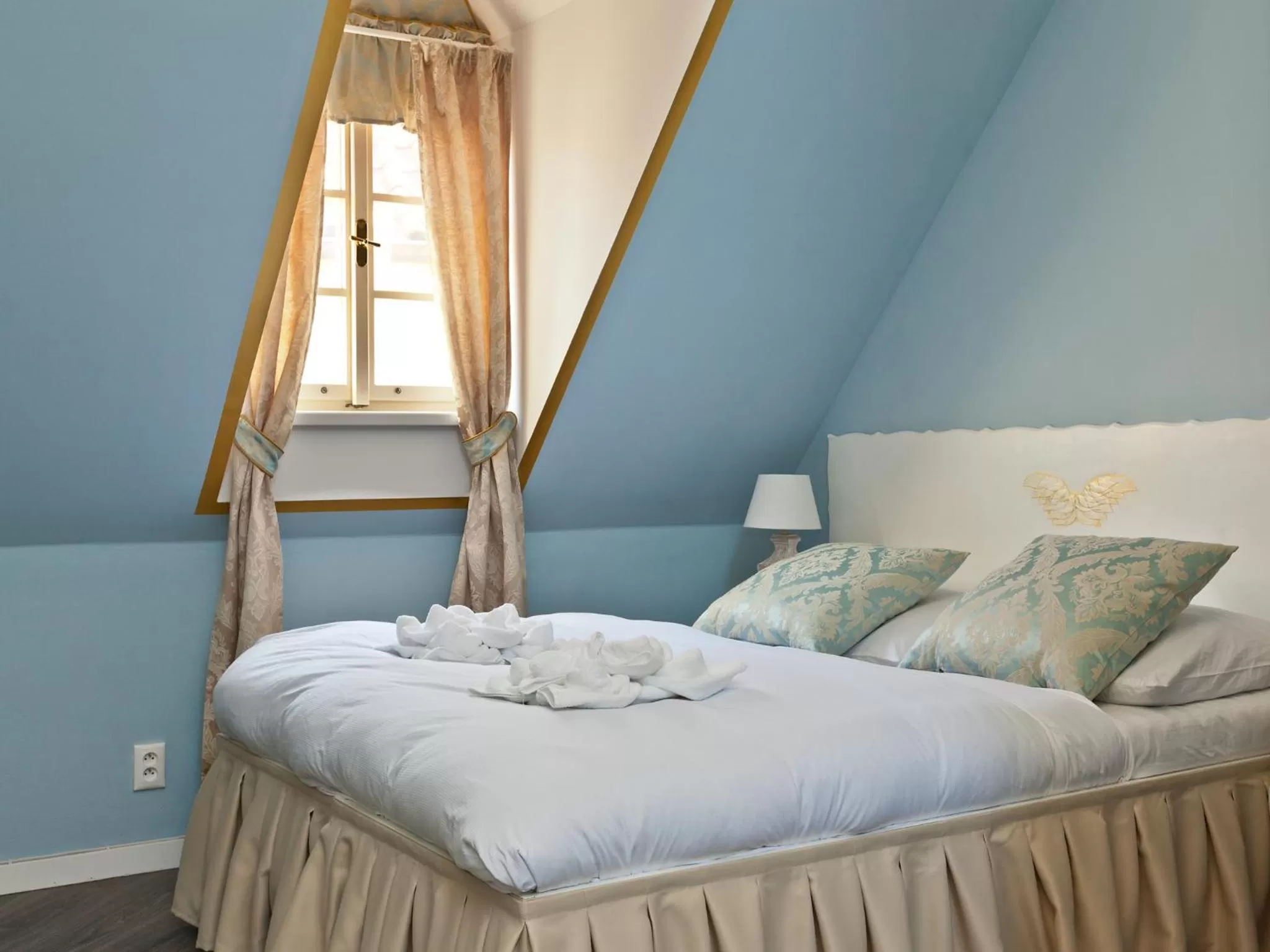 Bed in Cathedral Prague Apartments