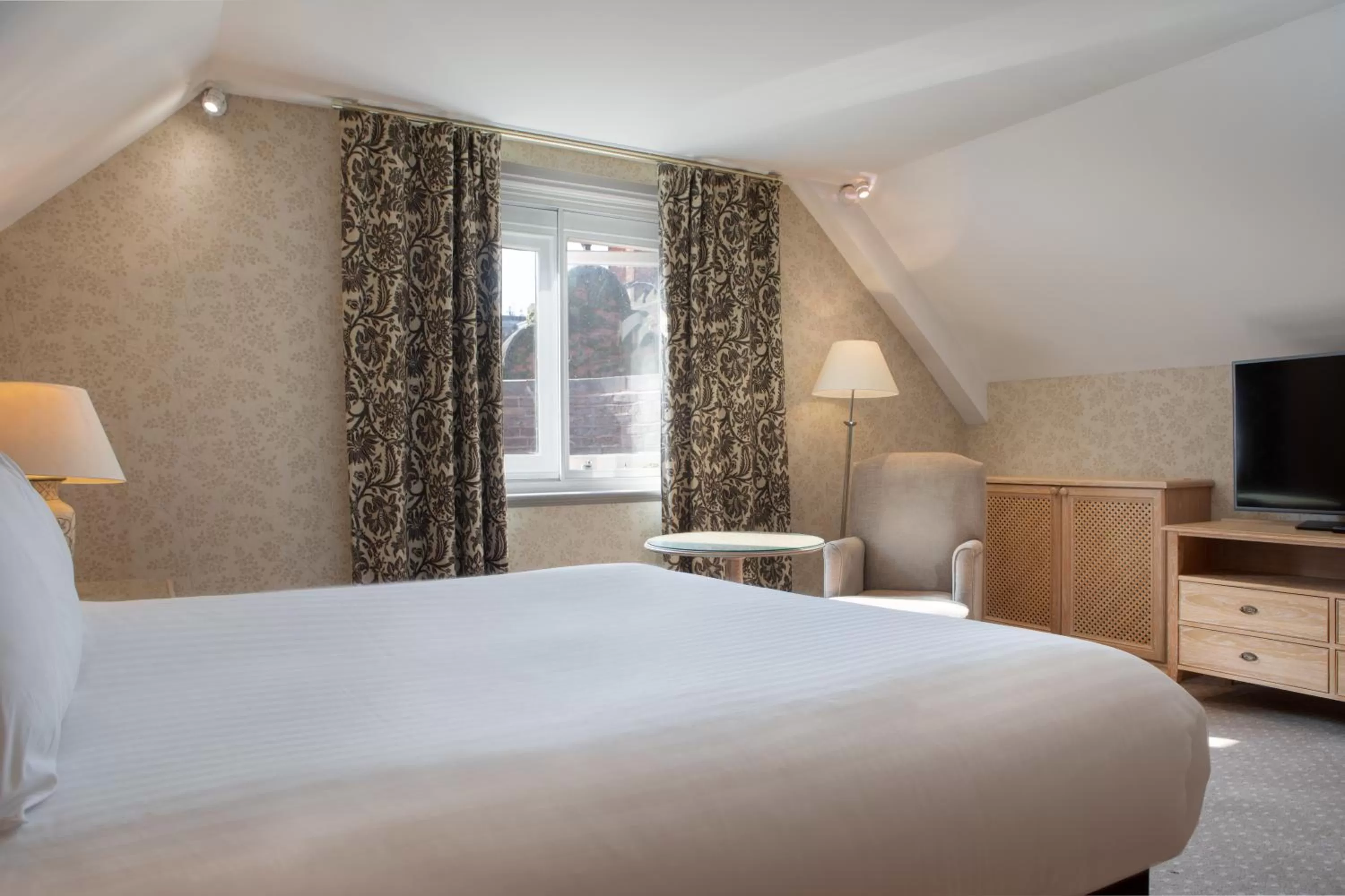 Bed in The Welcombe Golf & Spa Hotel