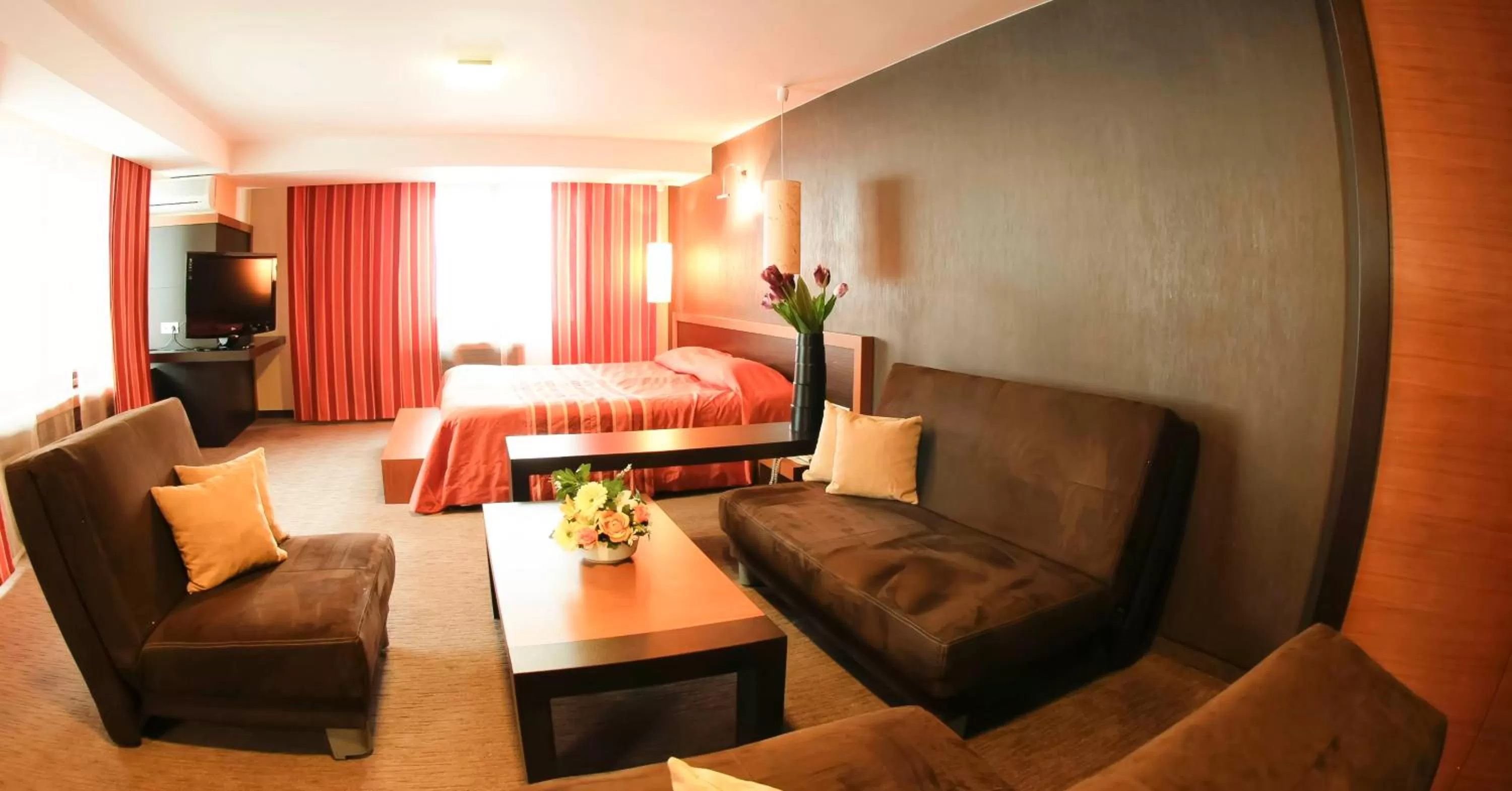 Living room, Bed in Edi Hotel