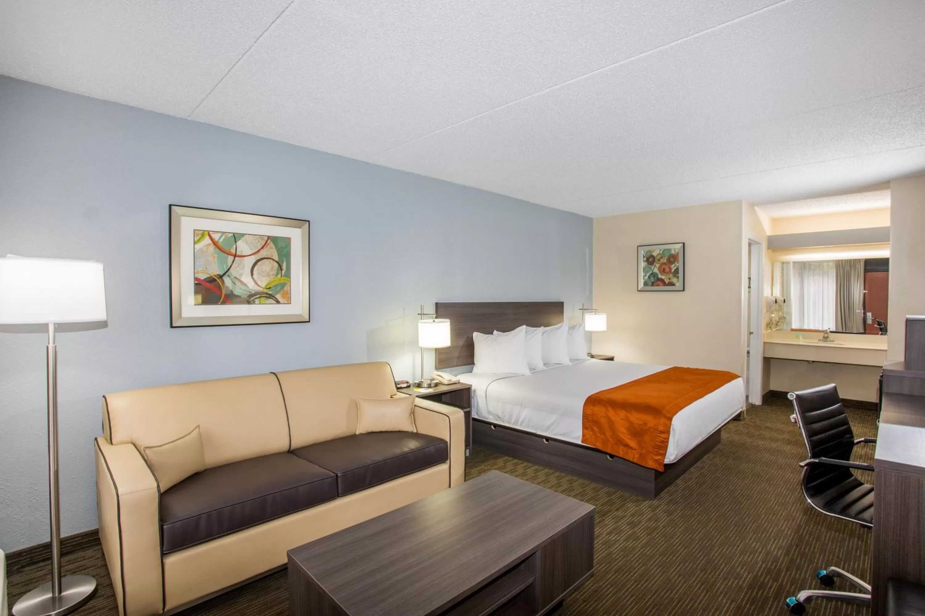 Photo of the whole room, Bed in Days Inn & Suites by Wyndham Orlando Airport