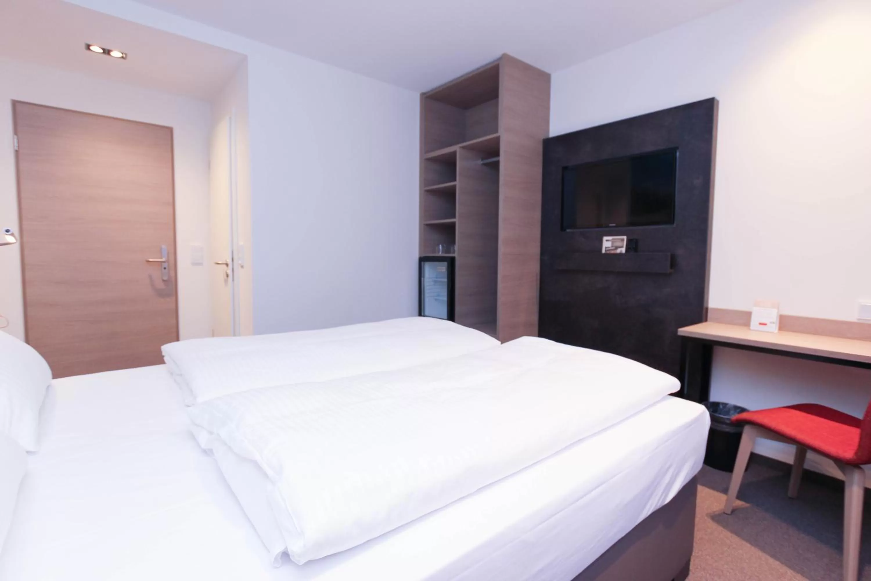 Bed in City Hotel Würzburg