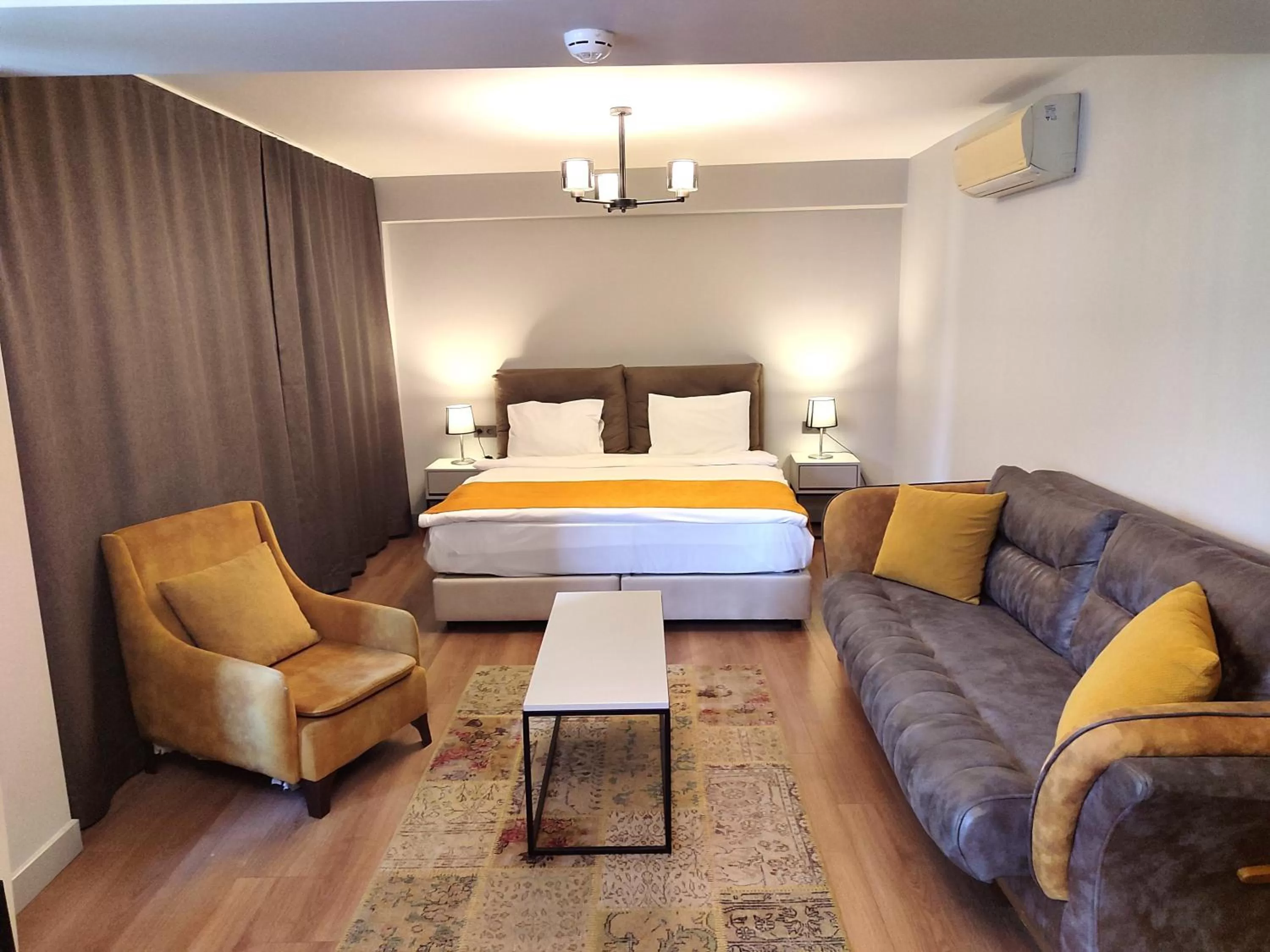 Living room, Bed in Galata World Hotel