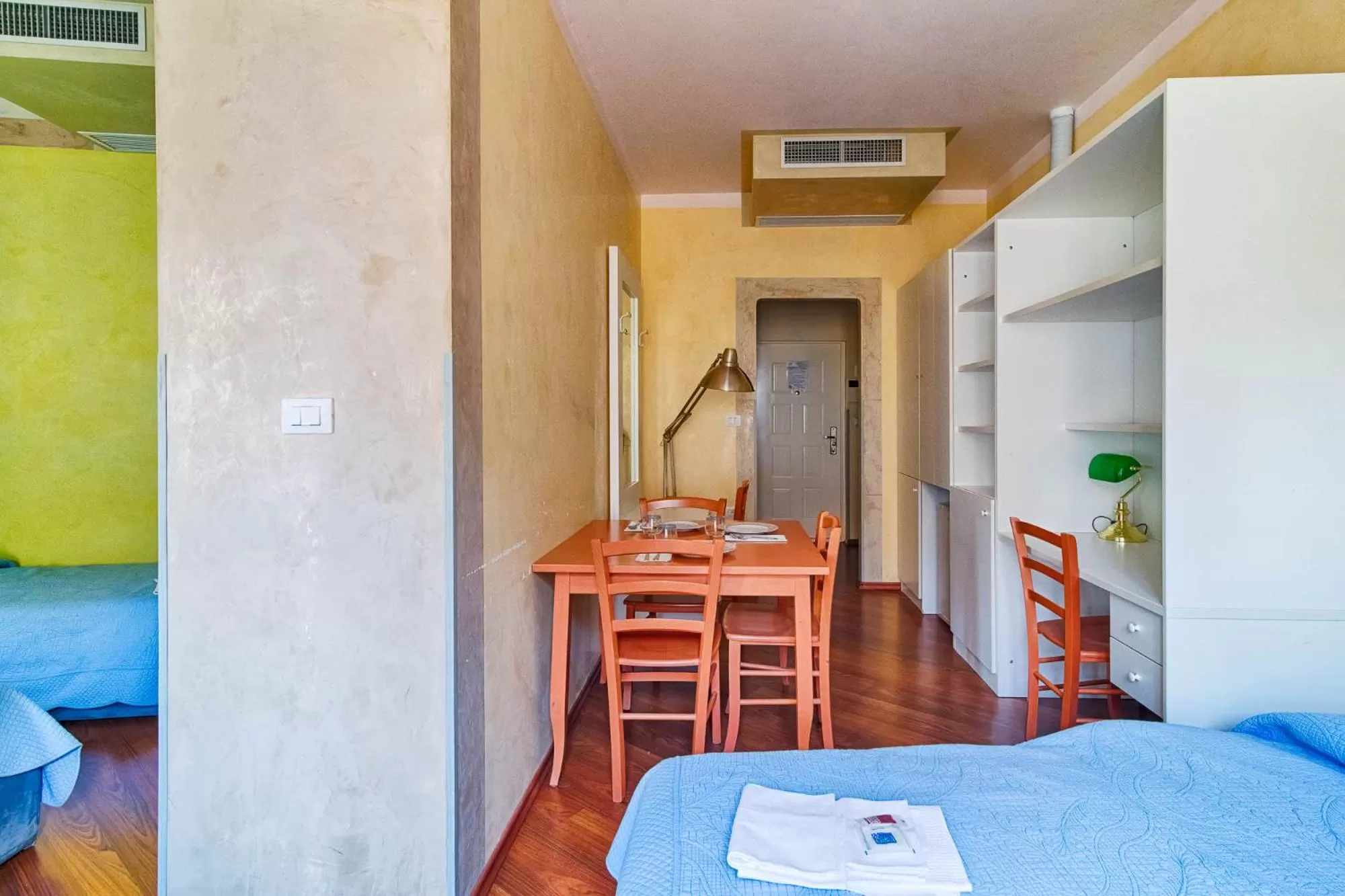 Communal lounge/ TV room, Bed in Lloyd Residence Triestino