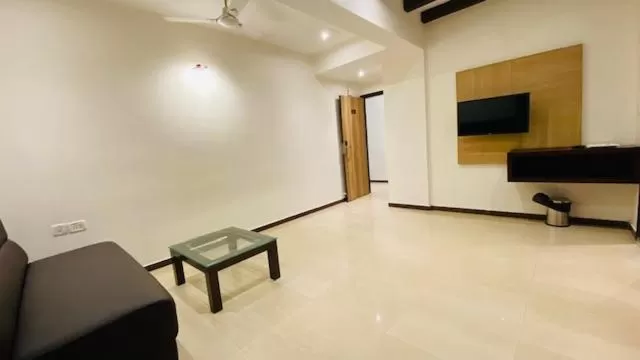 Living room in Hotel Plaza Heights by RAK Rooms, Mangaluru