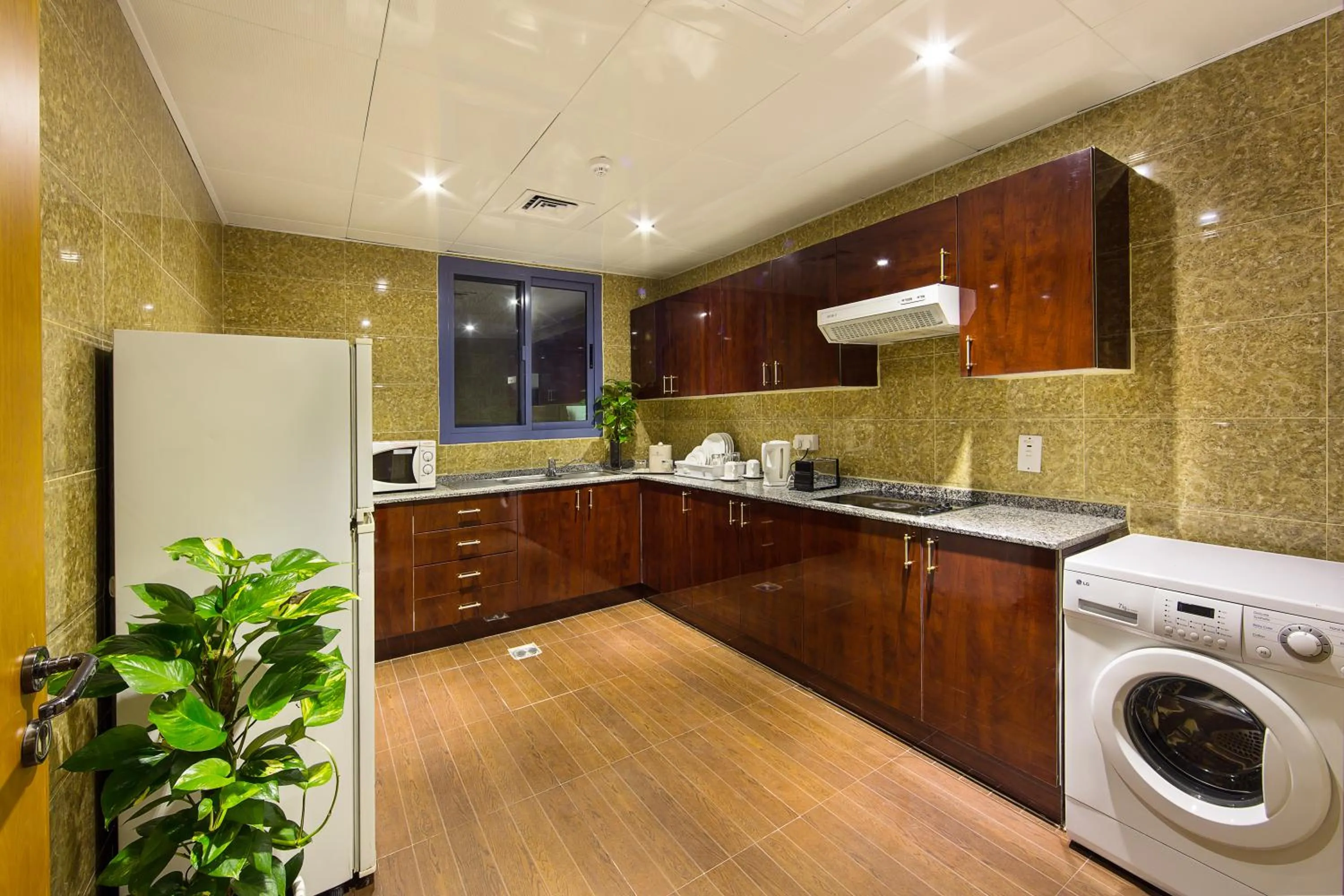 Kitchen or kitchenette in Rolla Residence Hotel Apartment