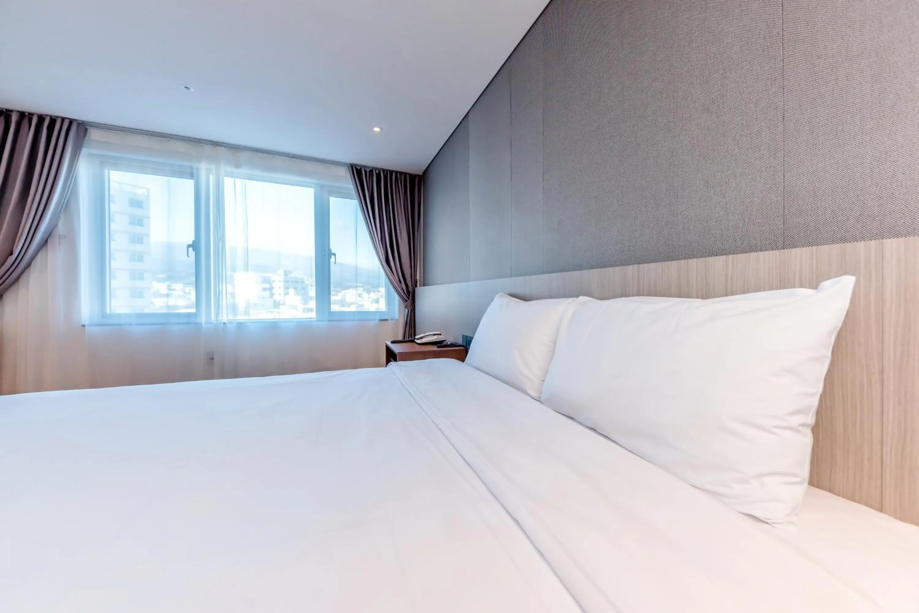 Bed in The First70 Hotel