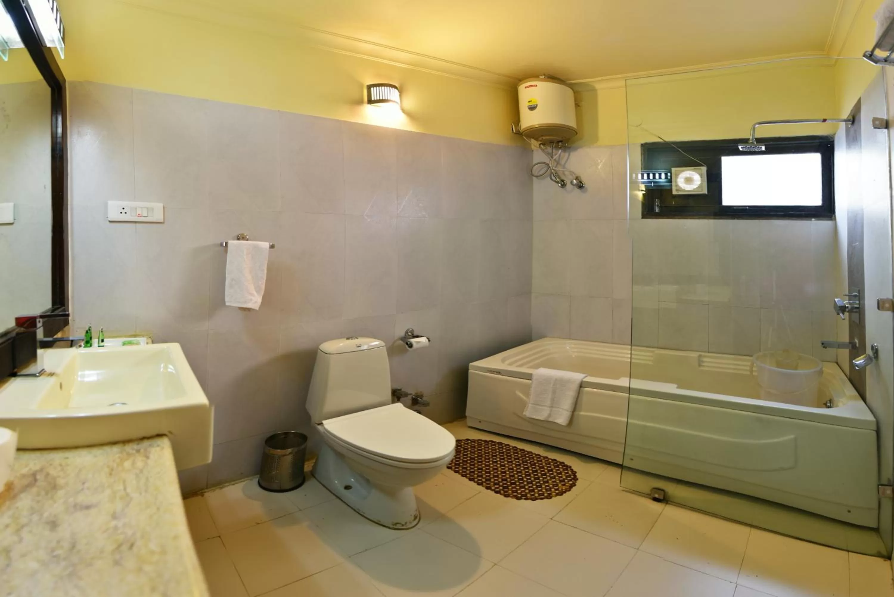 Bathroom in Indraprastha Resort - Centrally Heated Rooms, with Gym, Games & Spa