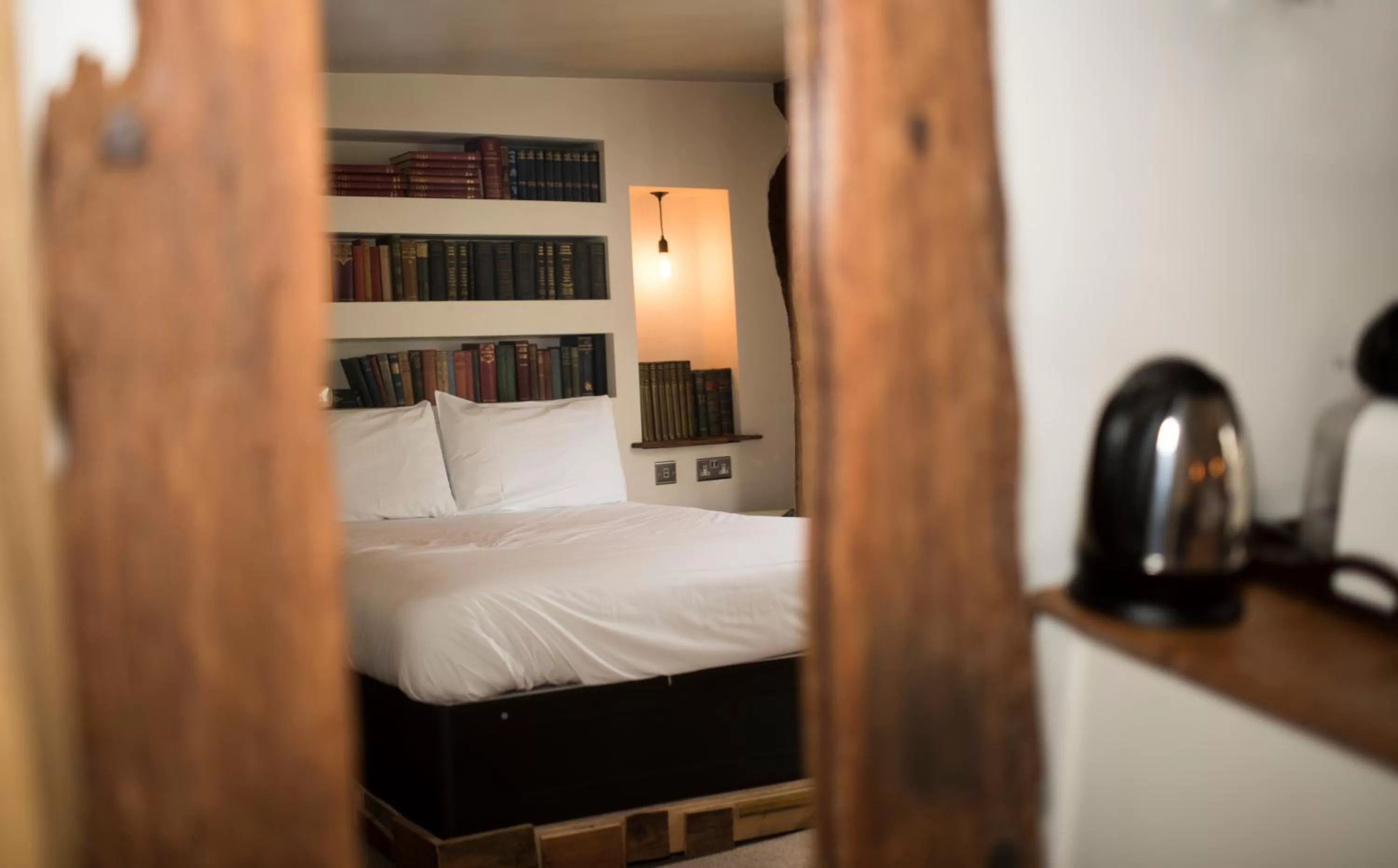 Decorative detail, Bed in Alma Inn & Dining Rooms